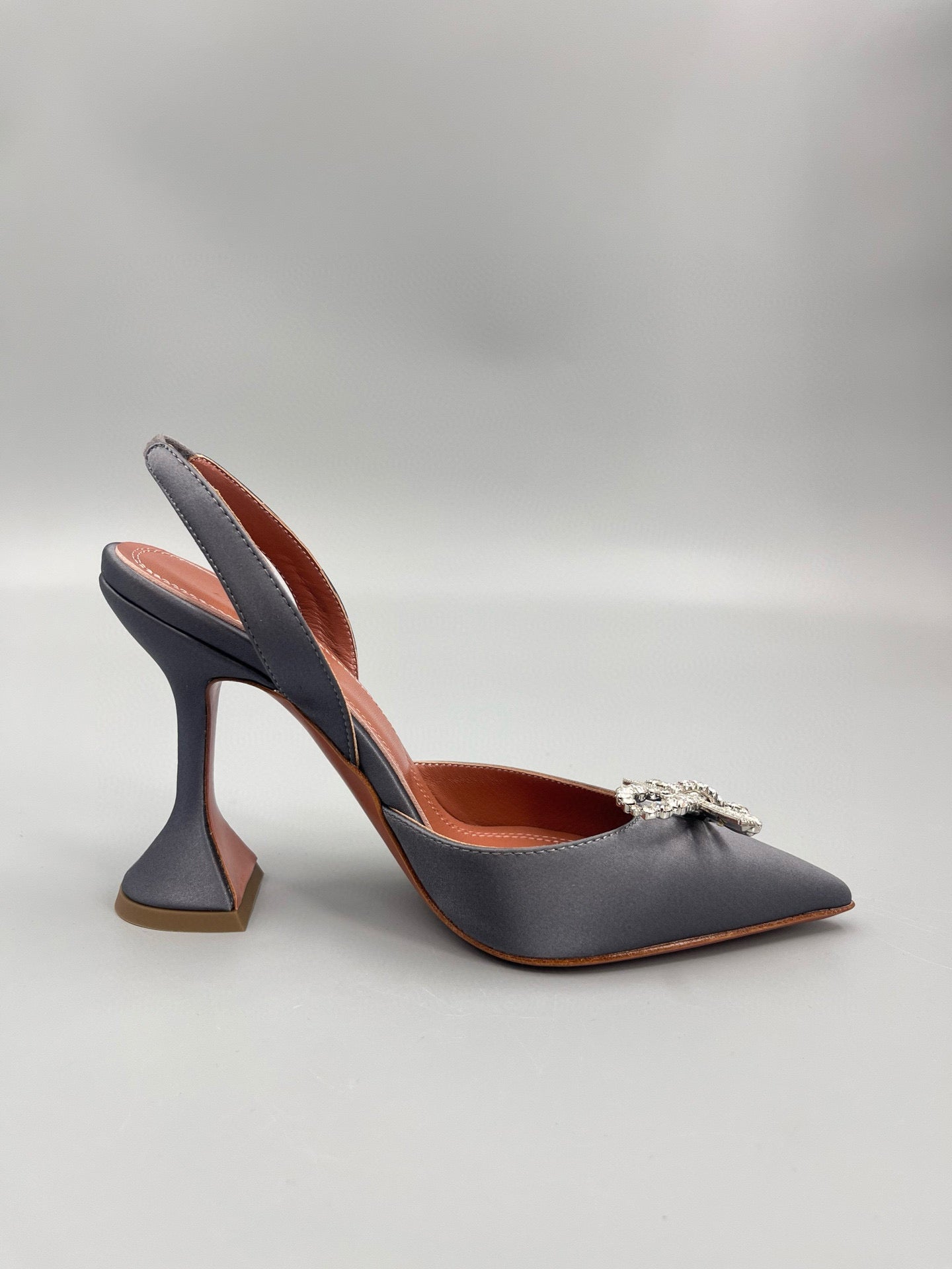 AMINA M HEELS