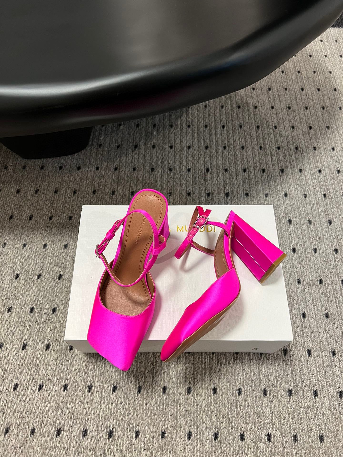 AMINA M HEELS