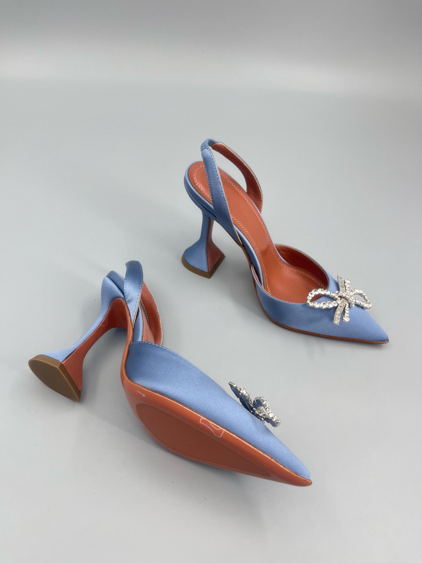 AMINA M HEELS