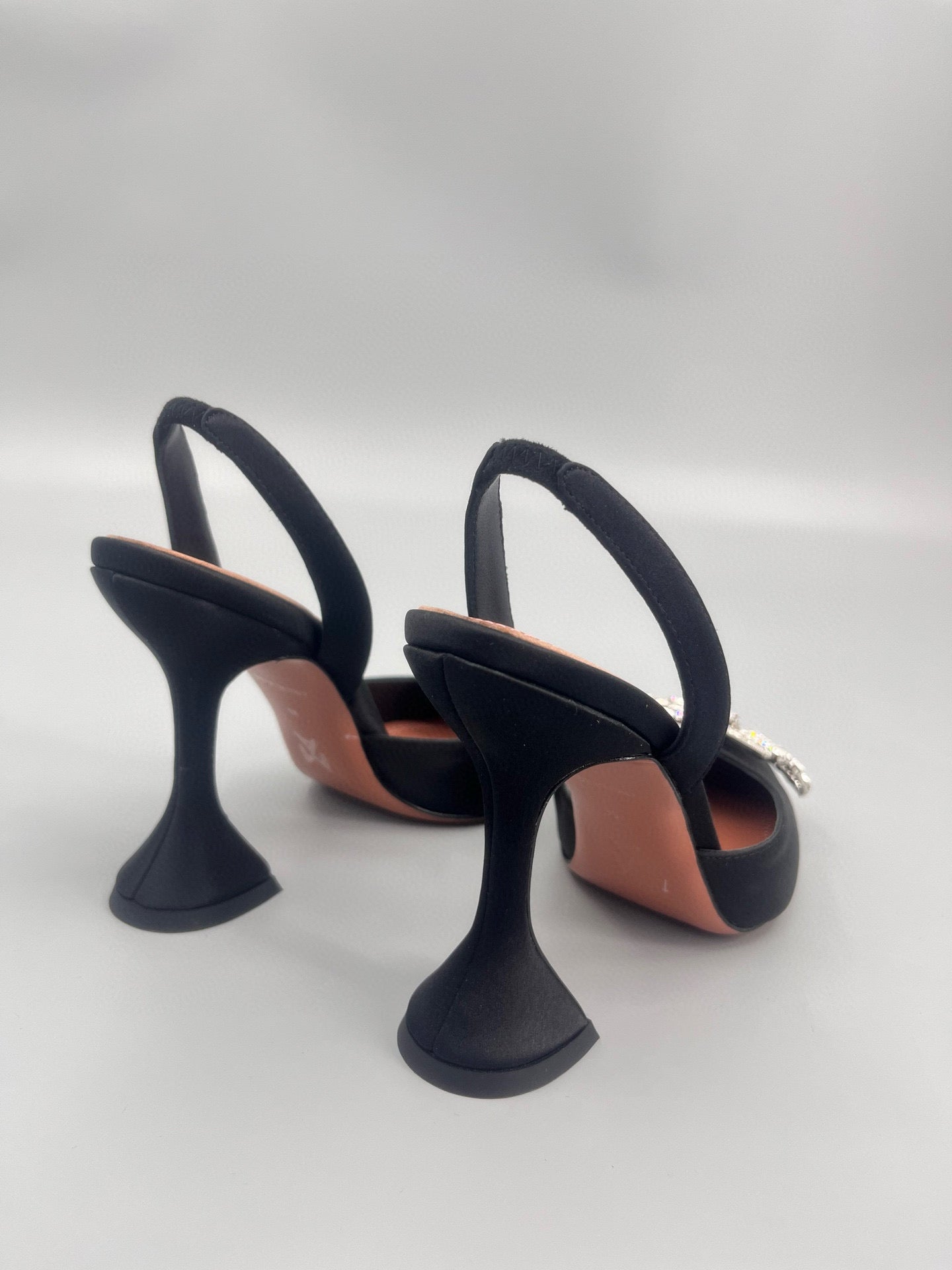 AMINA M HEELS