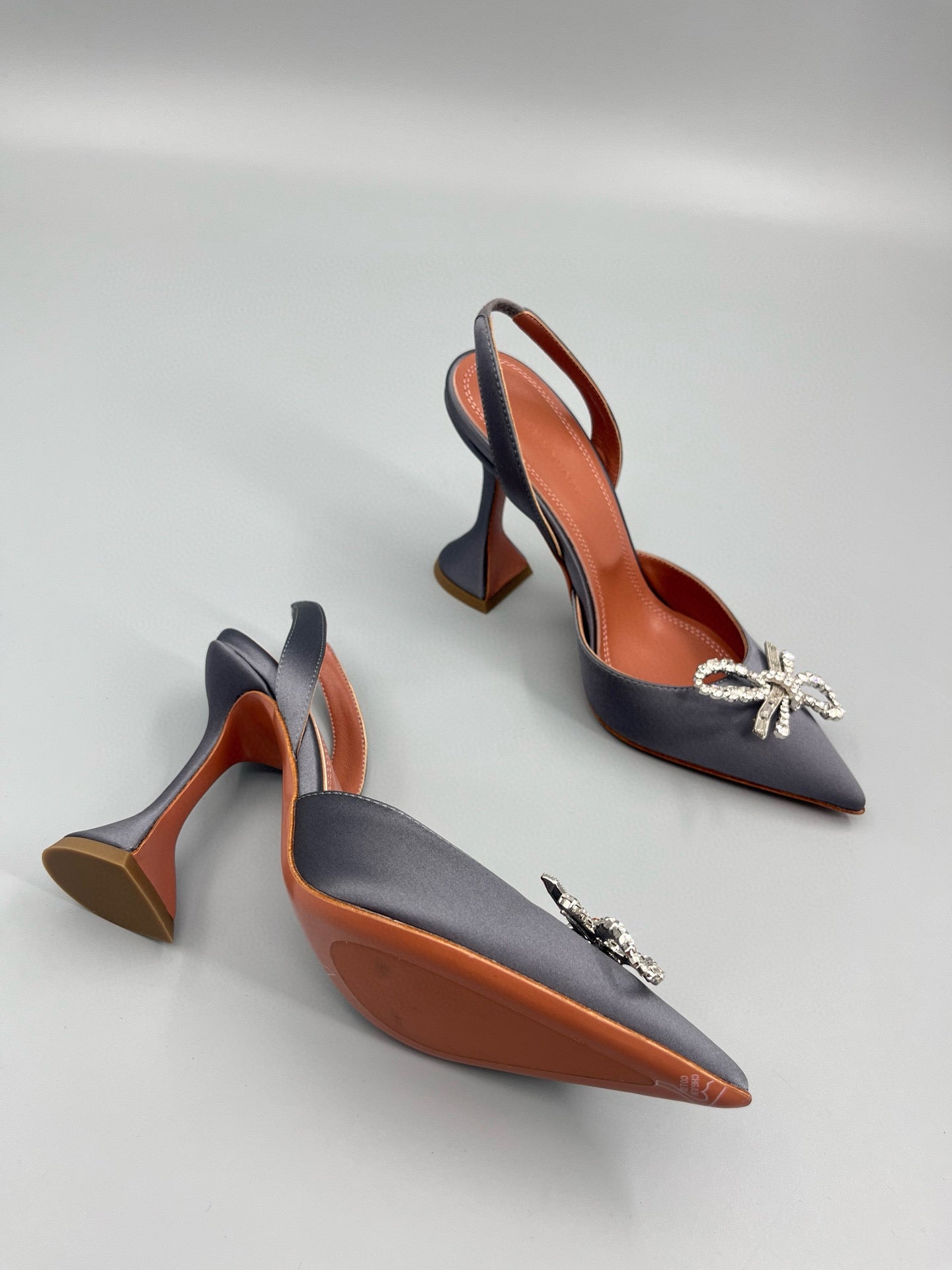 AMINA M HEELS