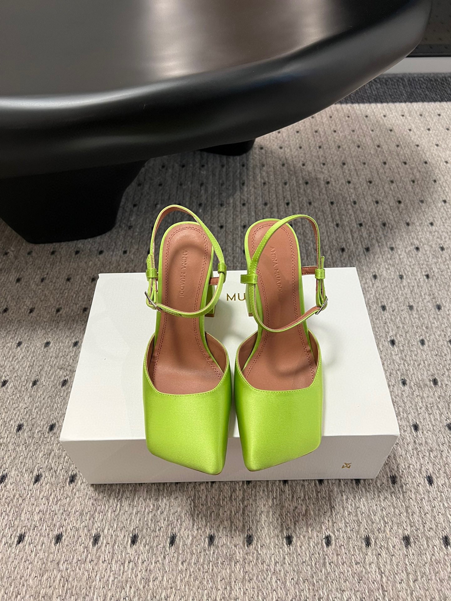 AMINA M HEELS