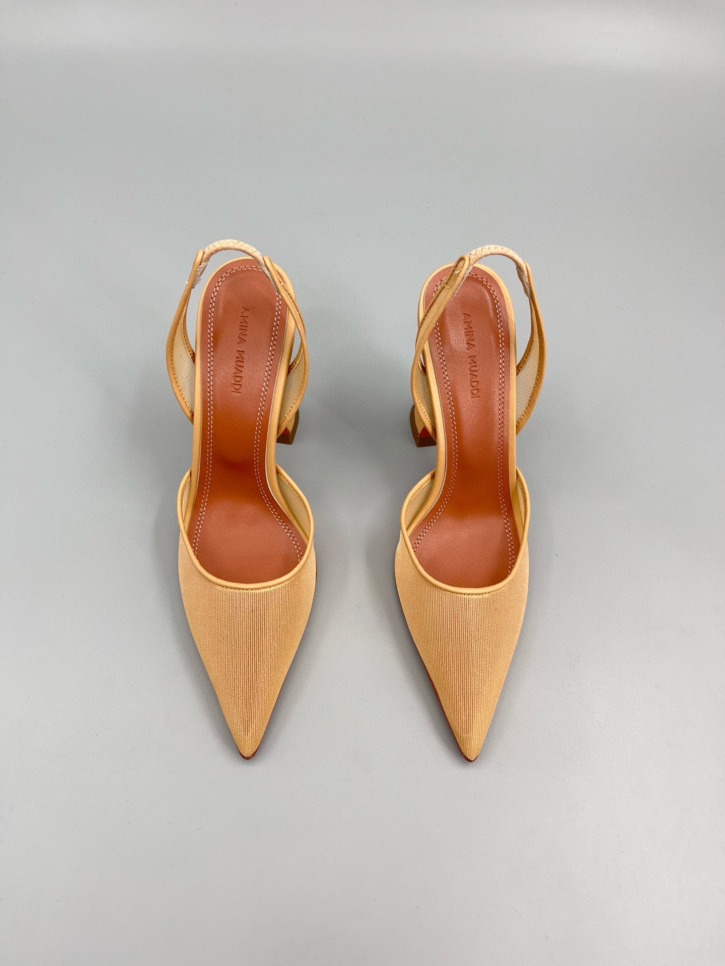 AMINA M HEELS