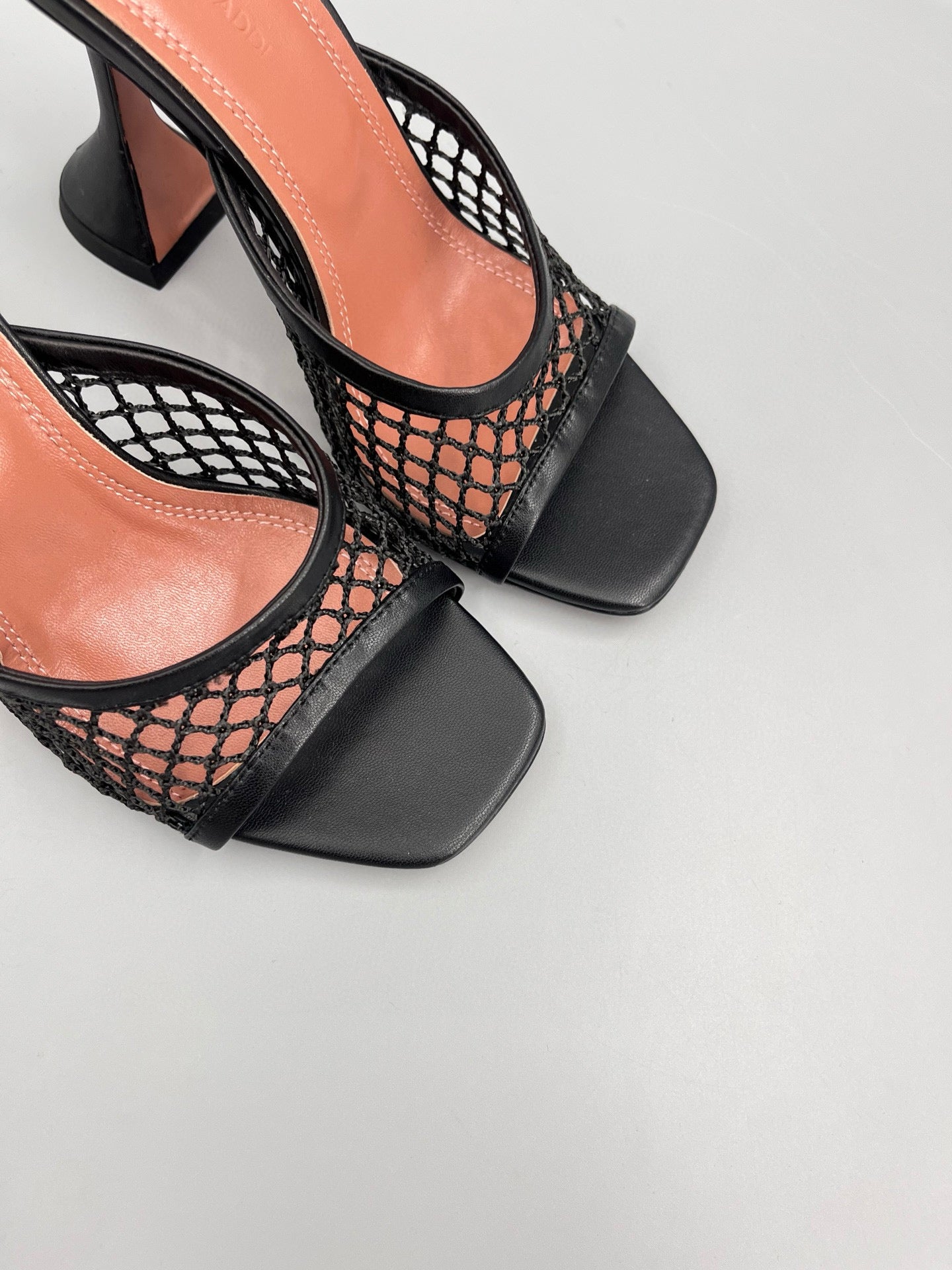 AMINA M HEELS