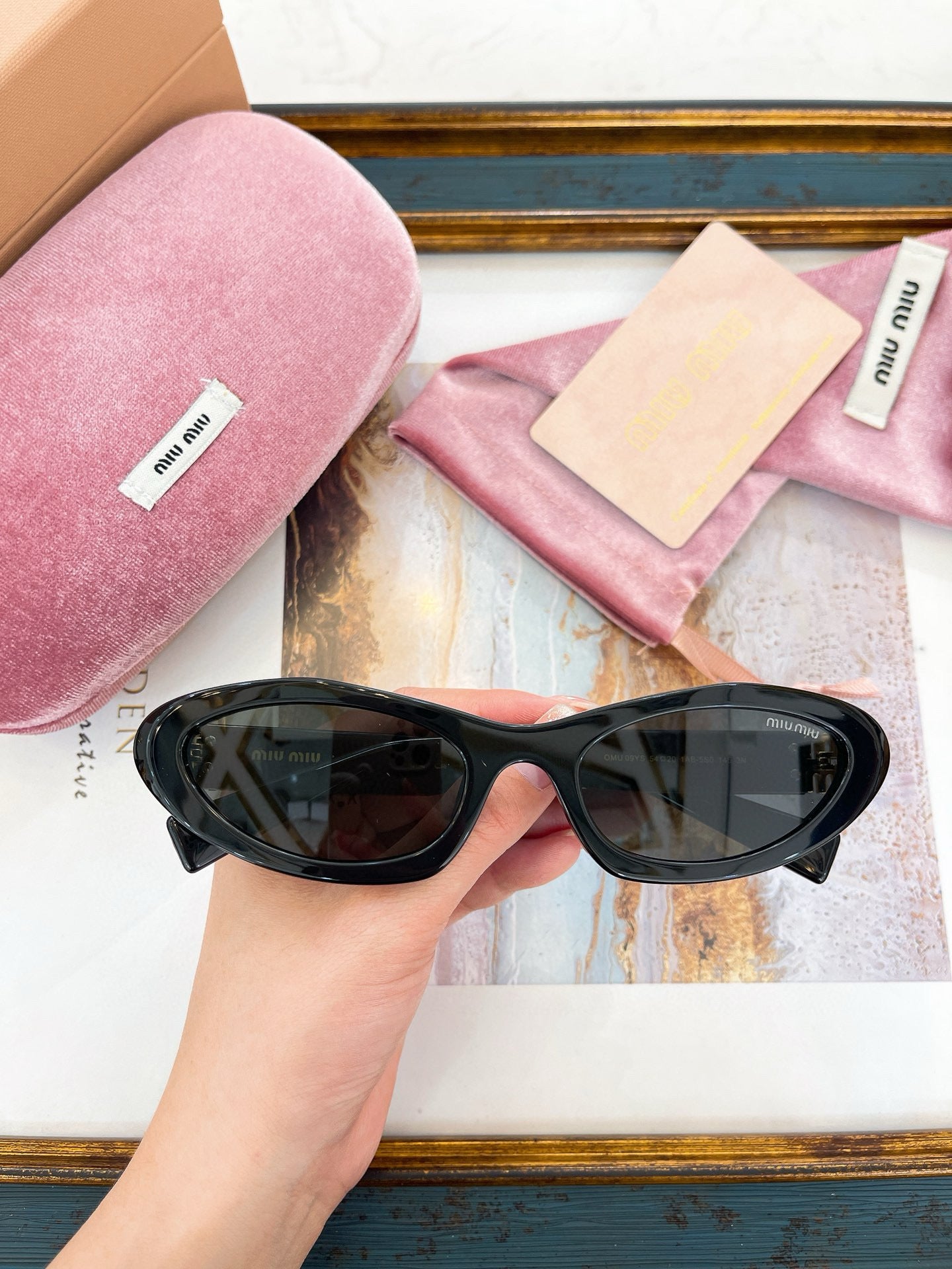 MIU M SUNGLASSES