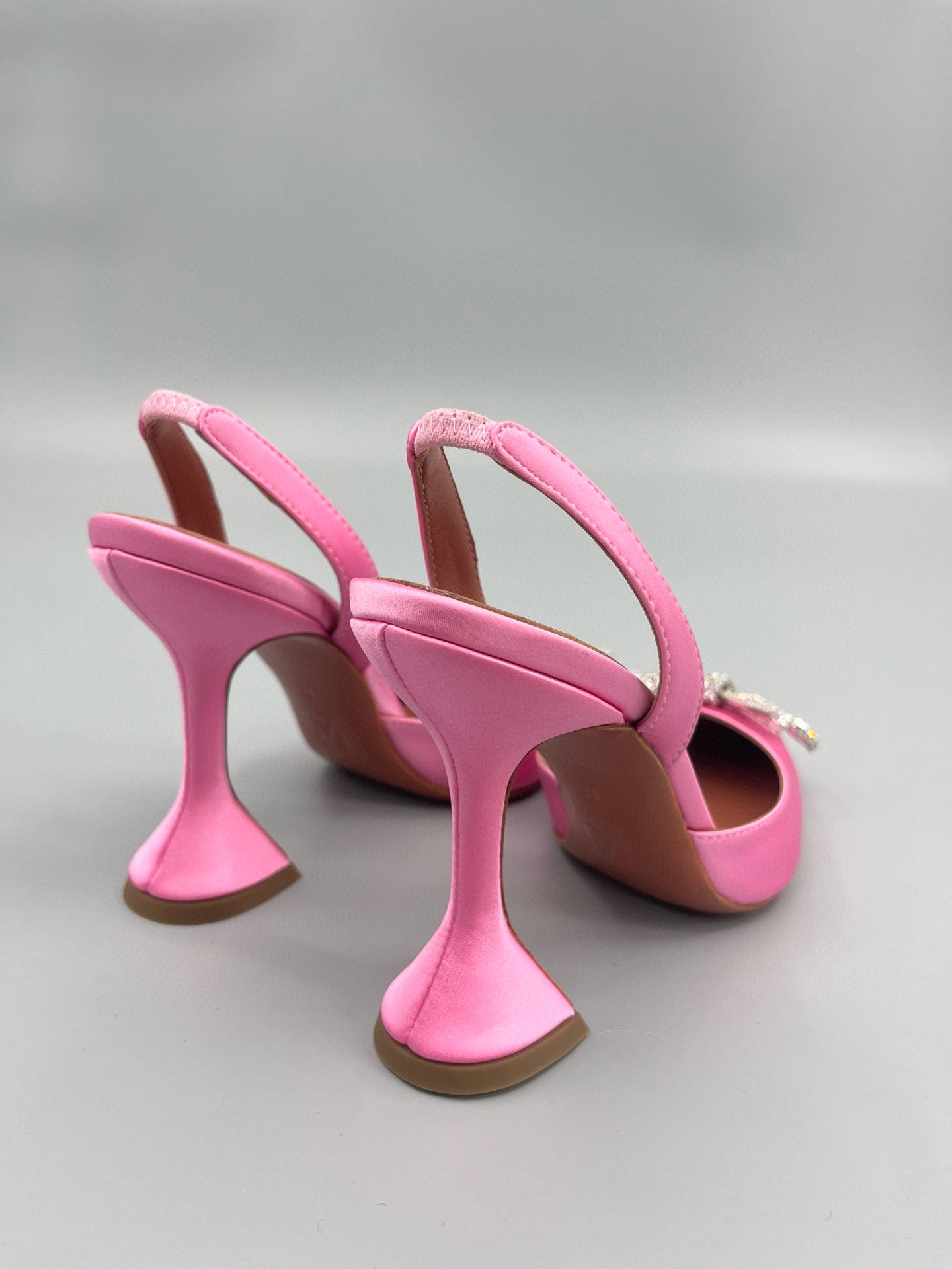 AMINA M HEELS