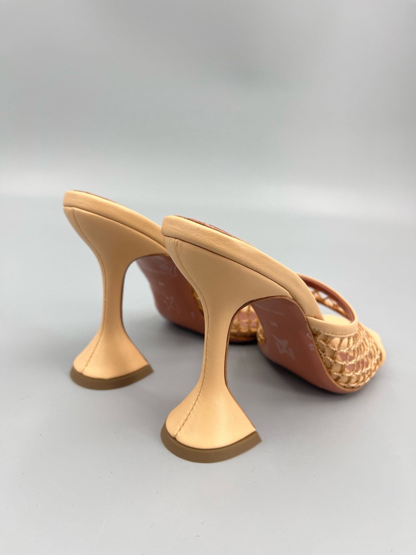 AMINA M HEELS