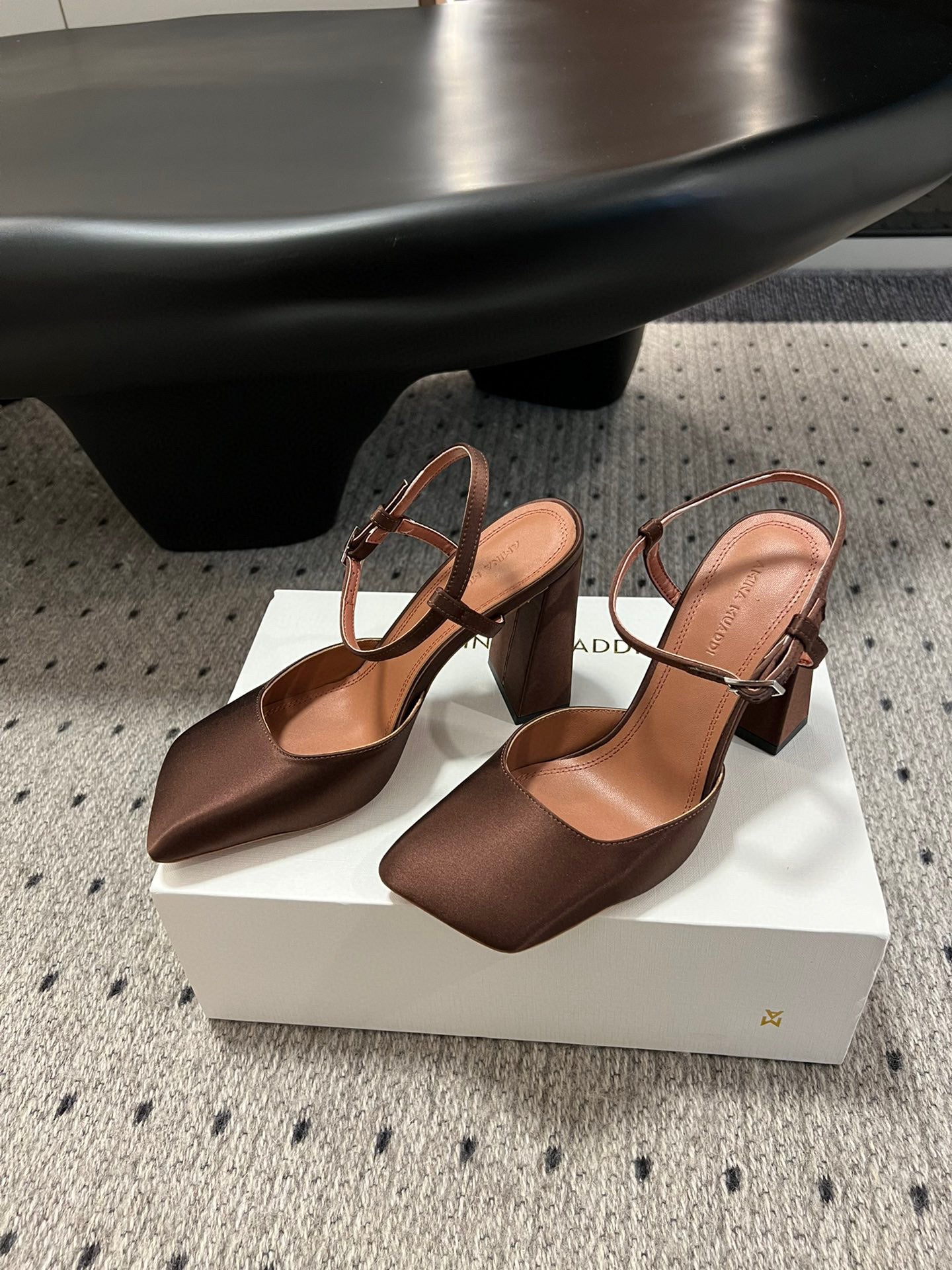 AMINA M HEELS