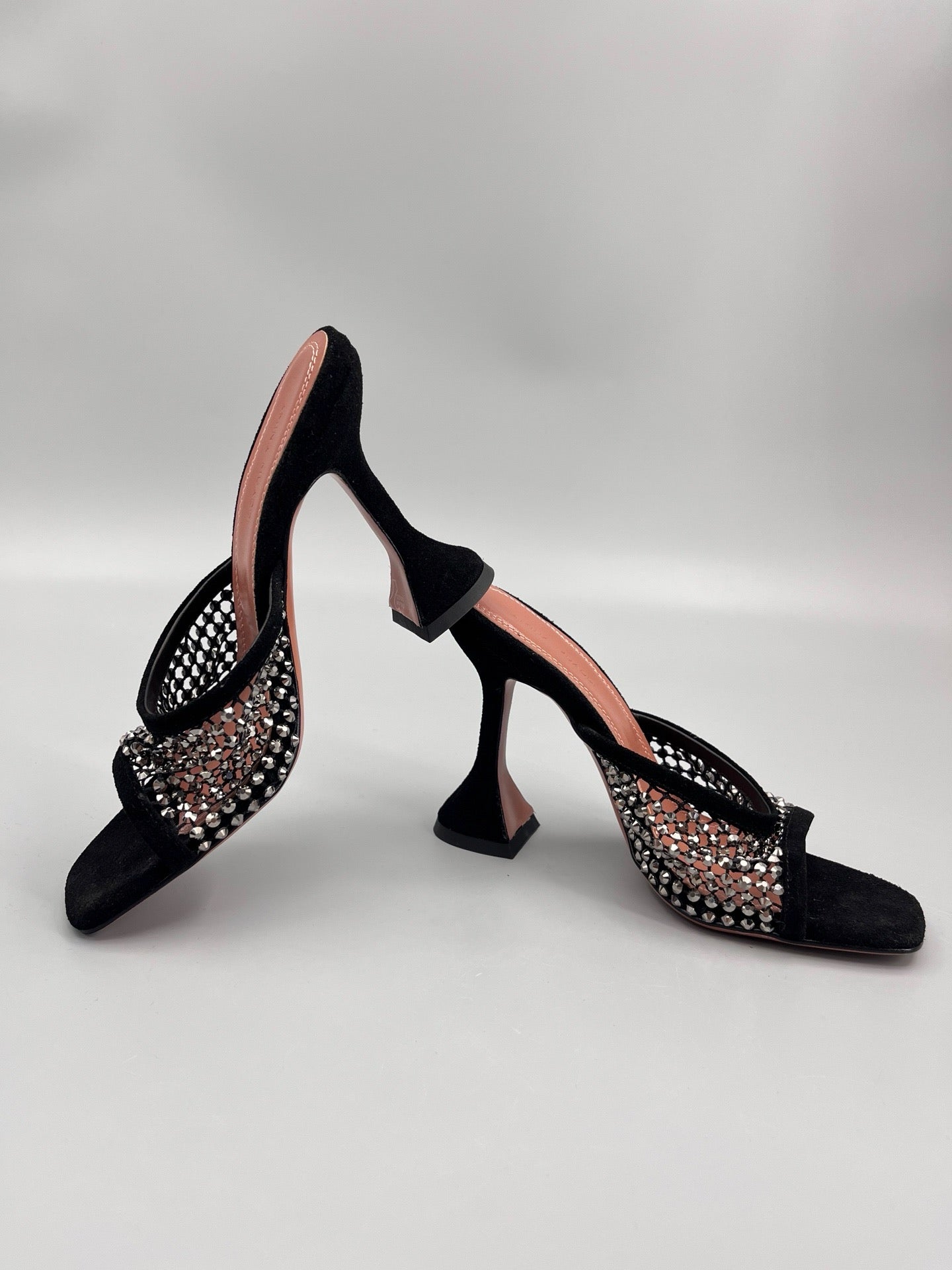 AMINA M HEELS