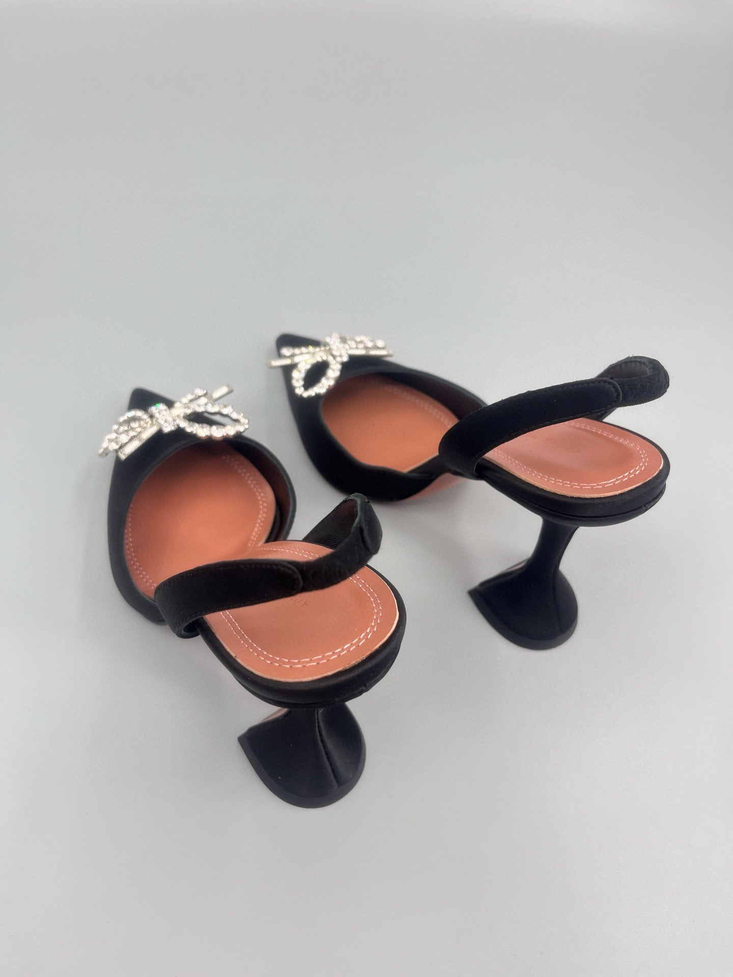 AMINA M HEELS