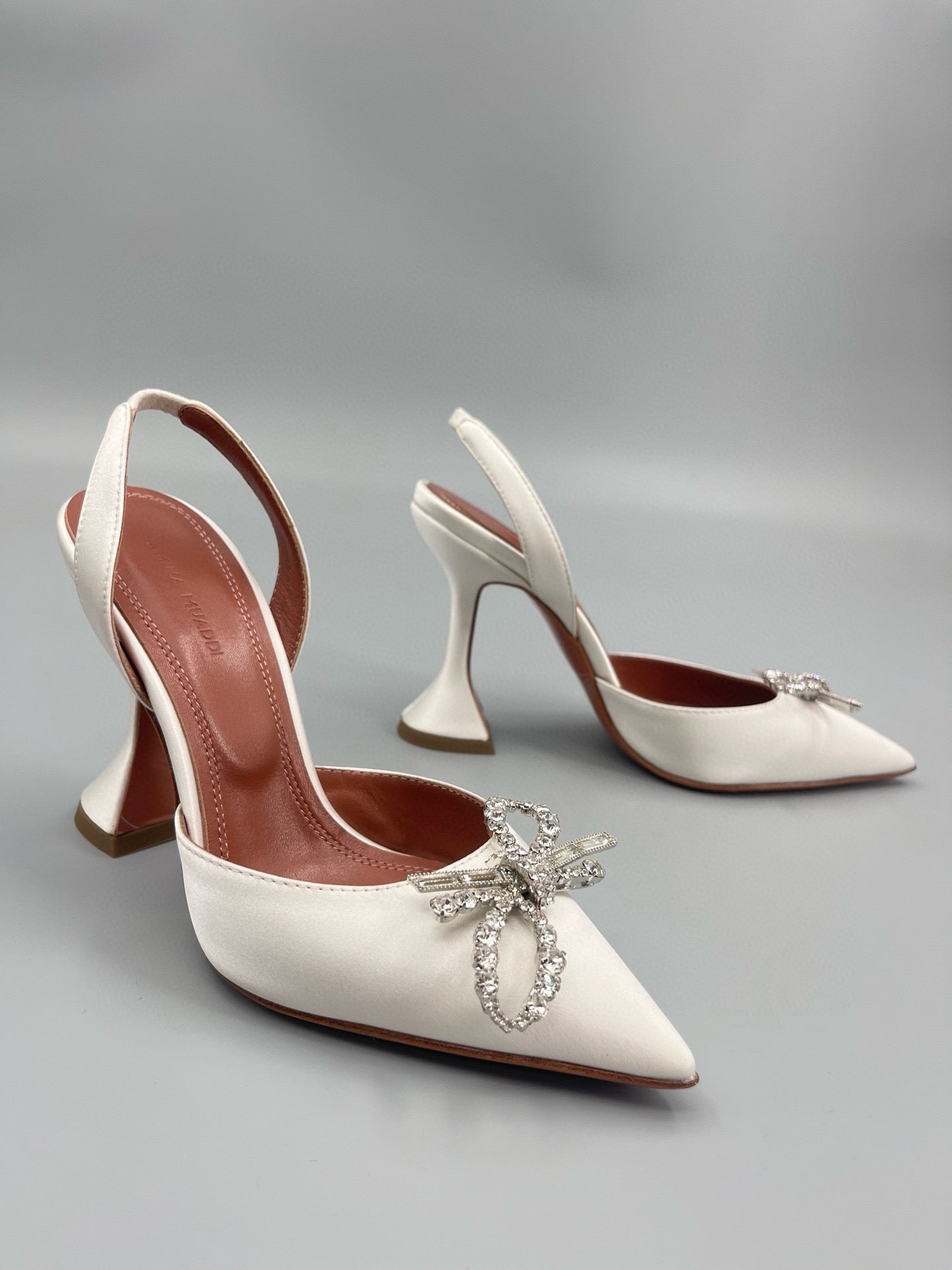 AMINA M HEELS