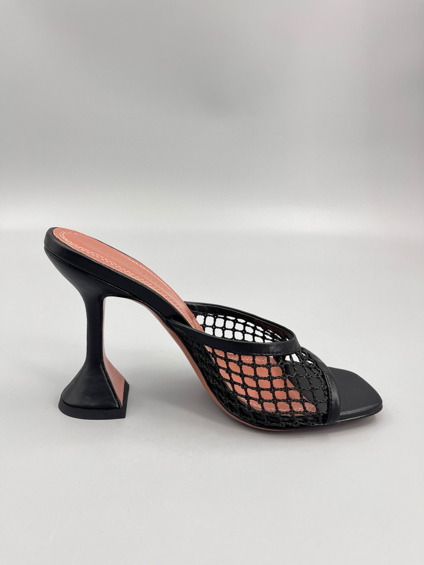 AMINA M HEELS