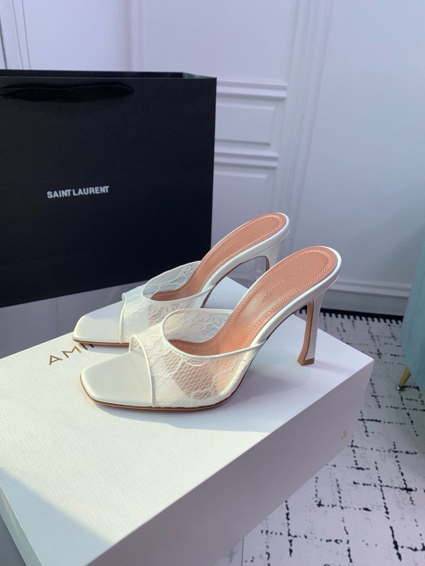 AMINA M HEELS