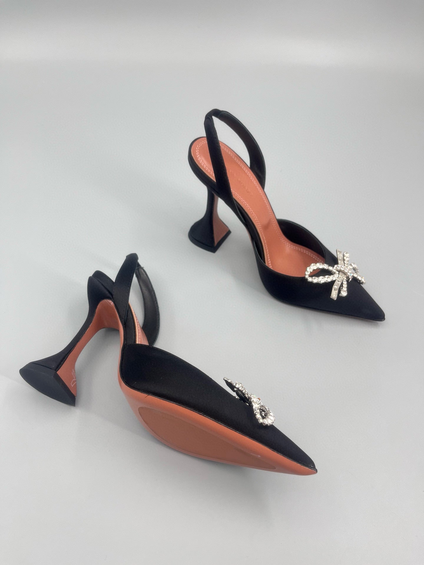 AMINA M HEELS