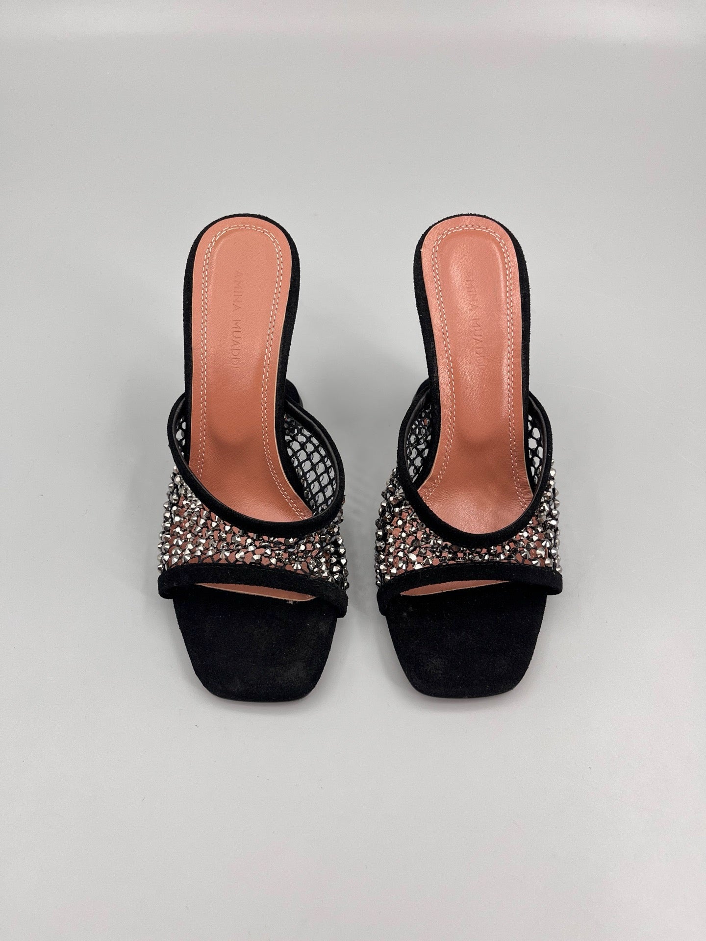 AMINA M HEELS