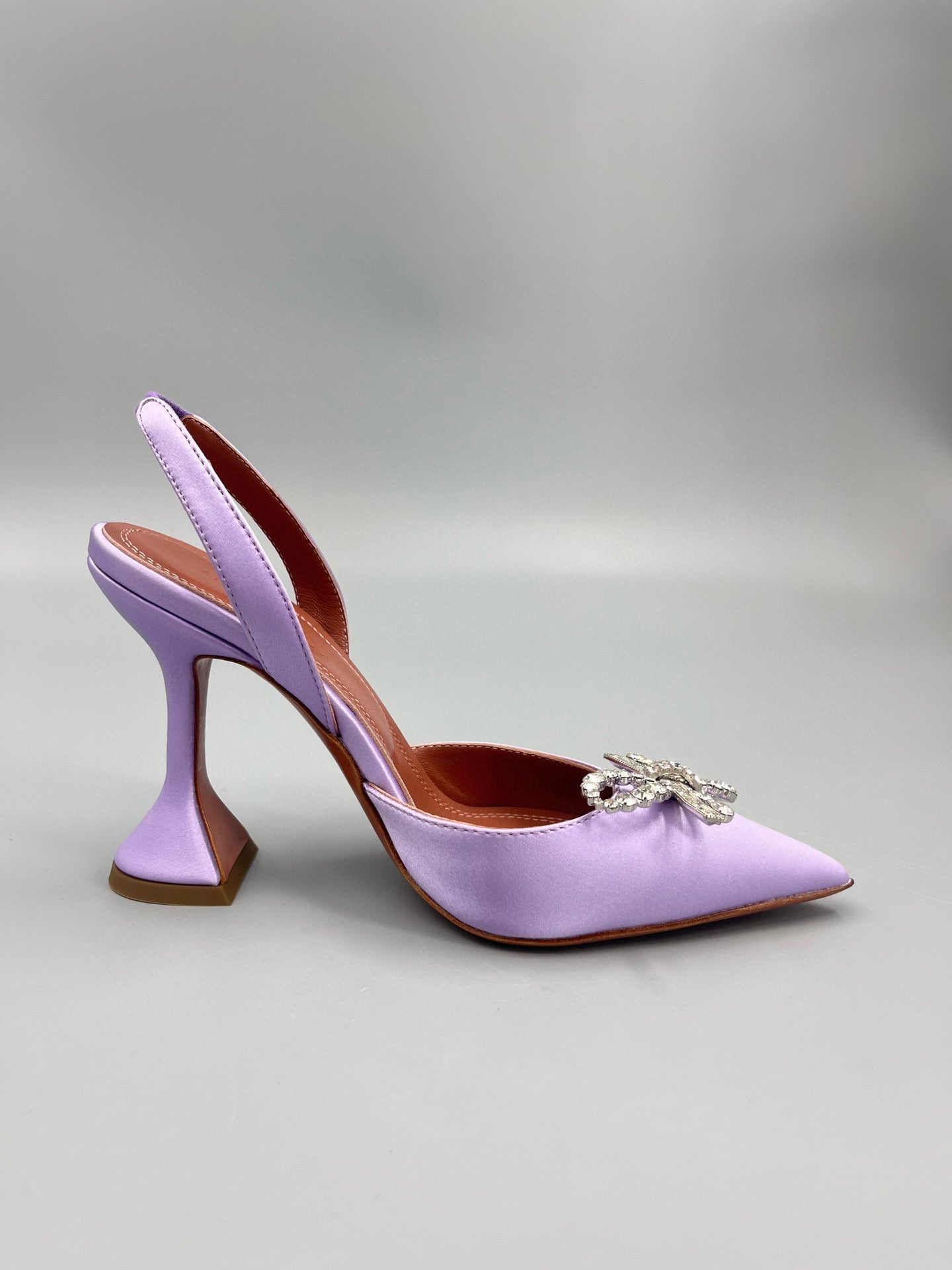 AMINA M HEELS