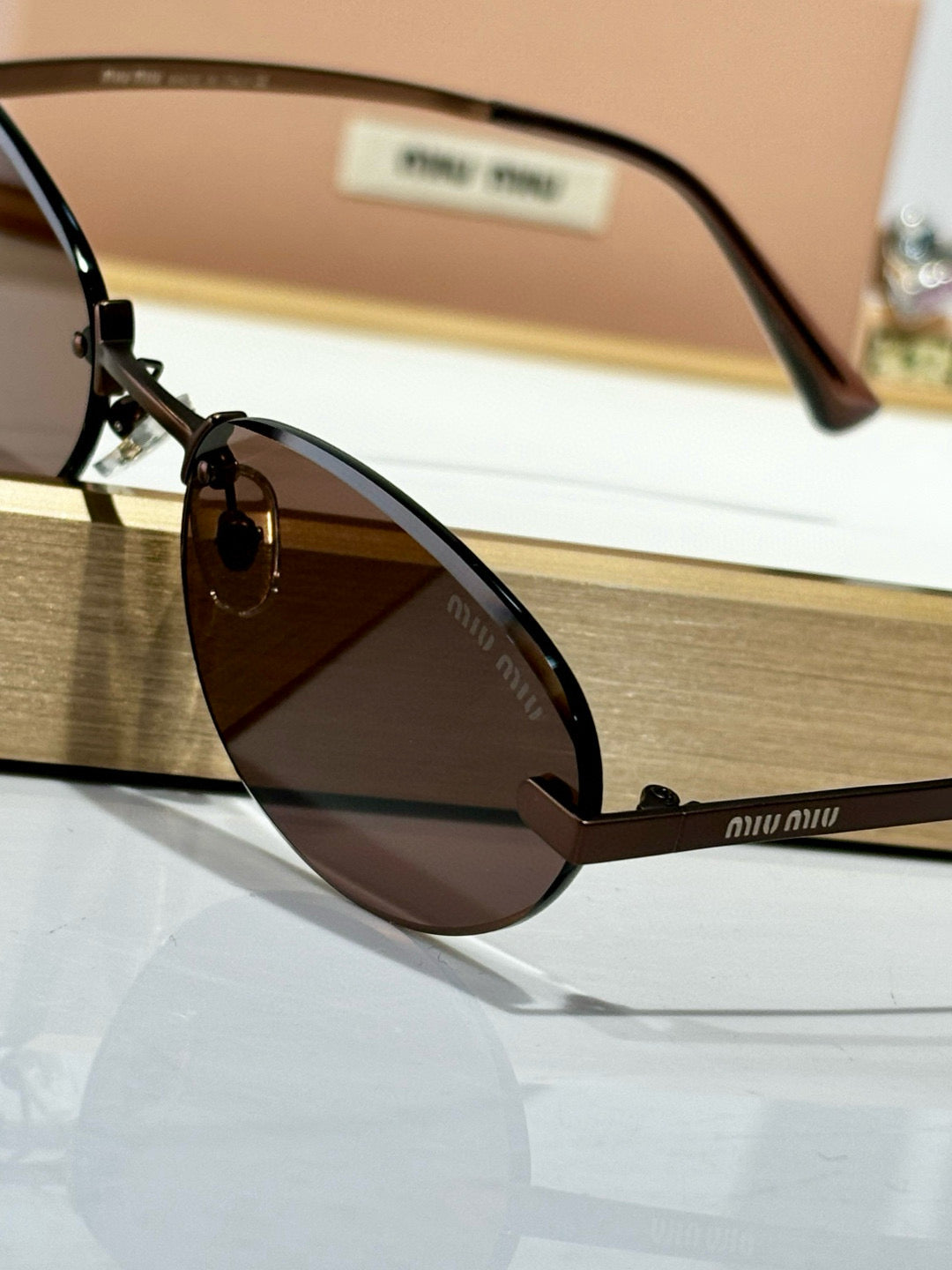 MIU M SUNGLASSES