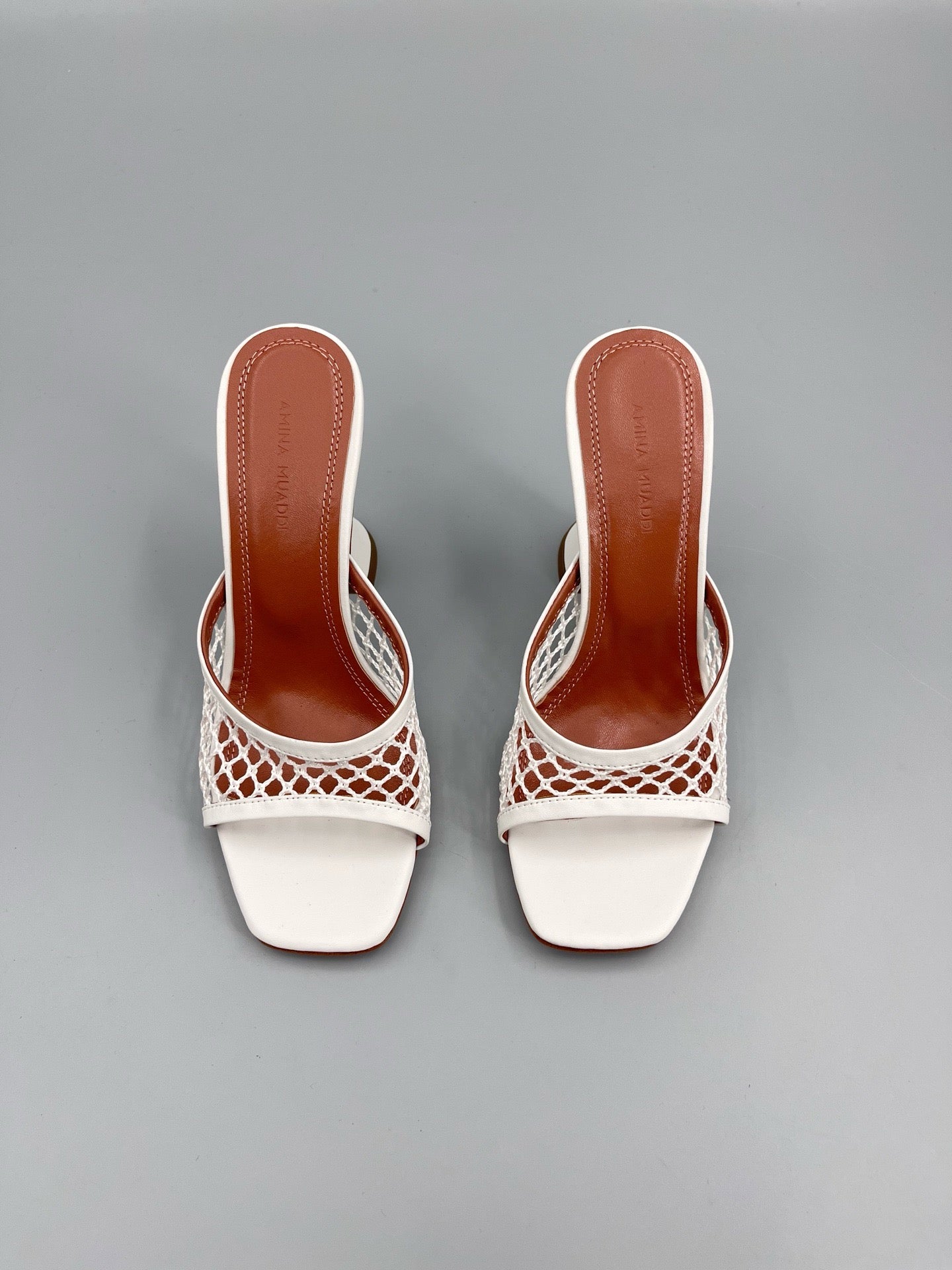 AMINA M HEELS