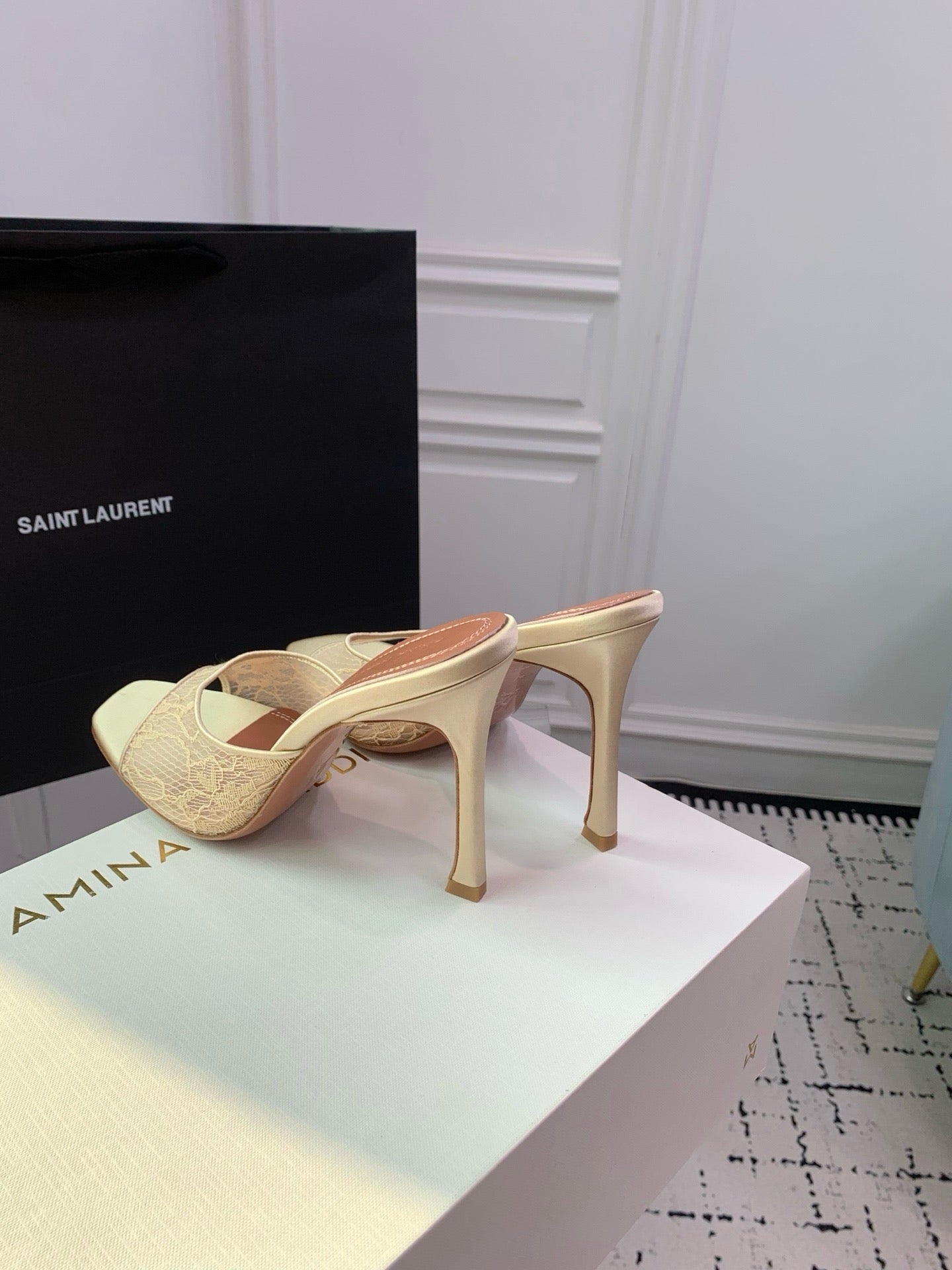 AMINA M HEELS
