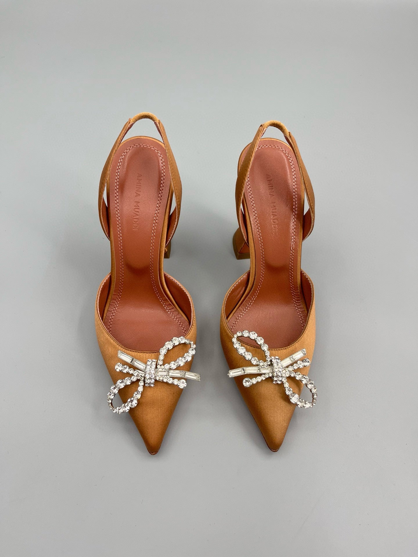 AMINA M HEELS