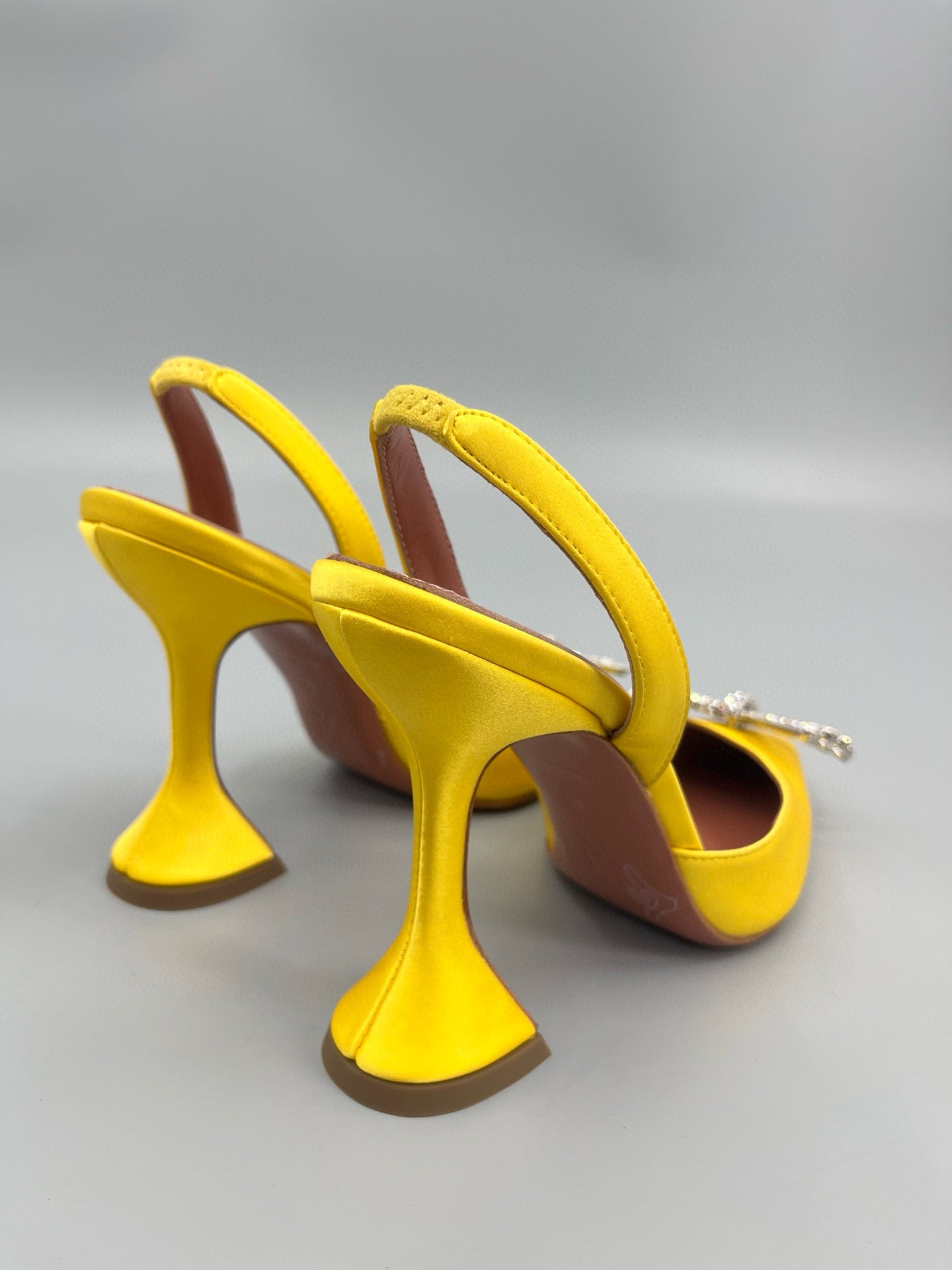 AMINA M HEELS