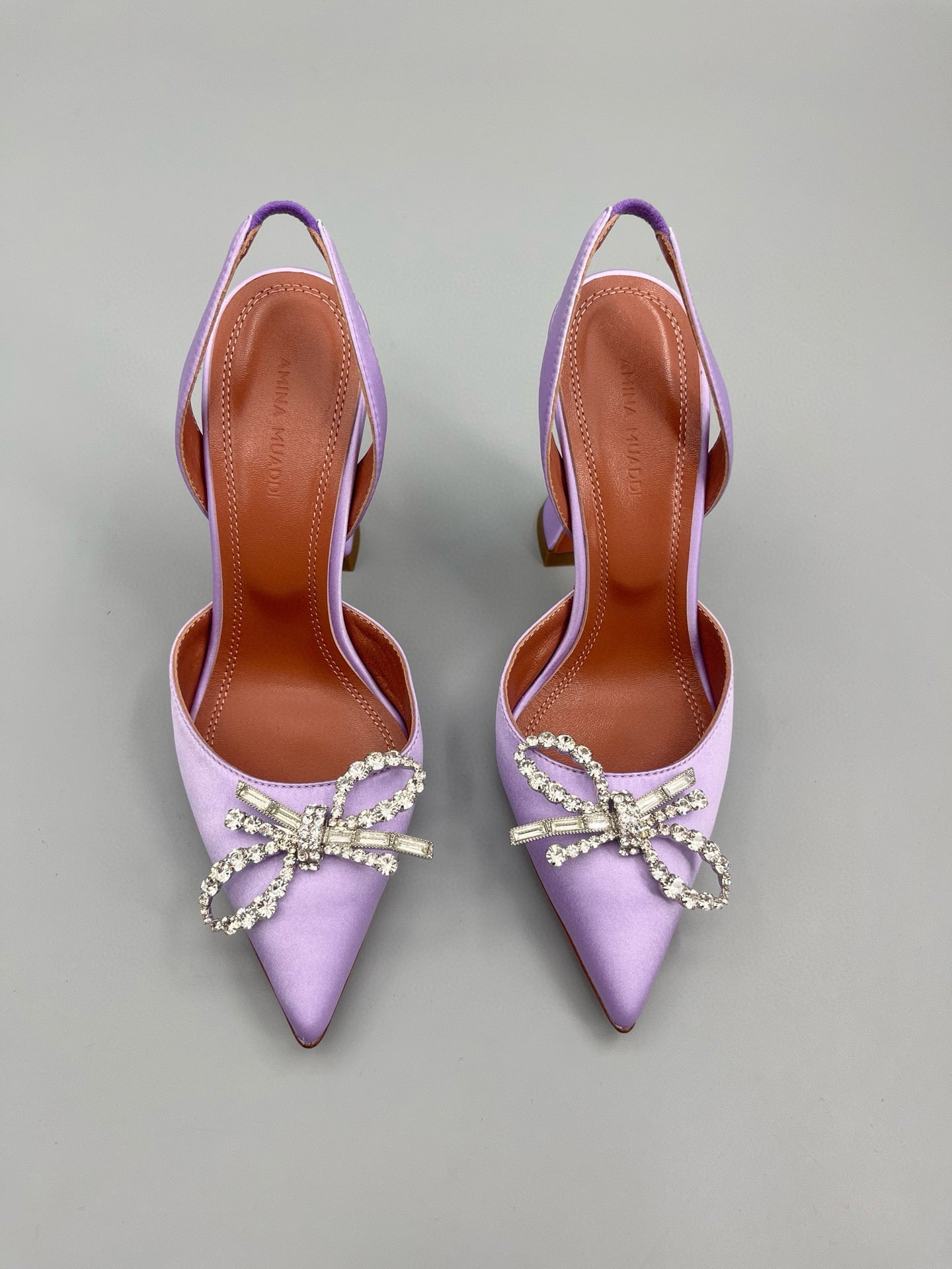 AMINA M HEELS