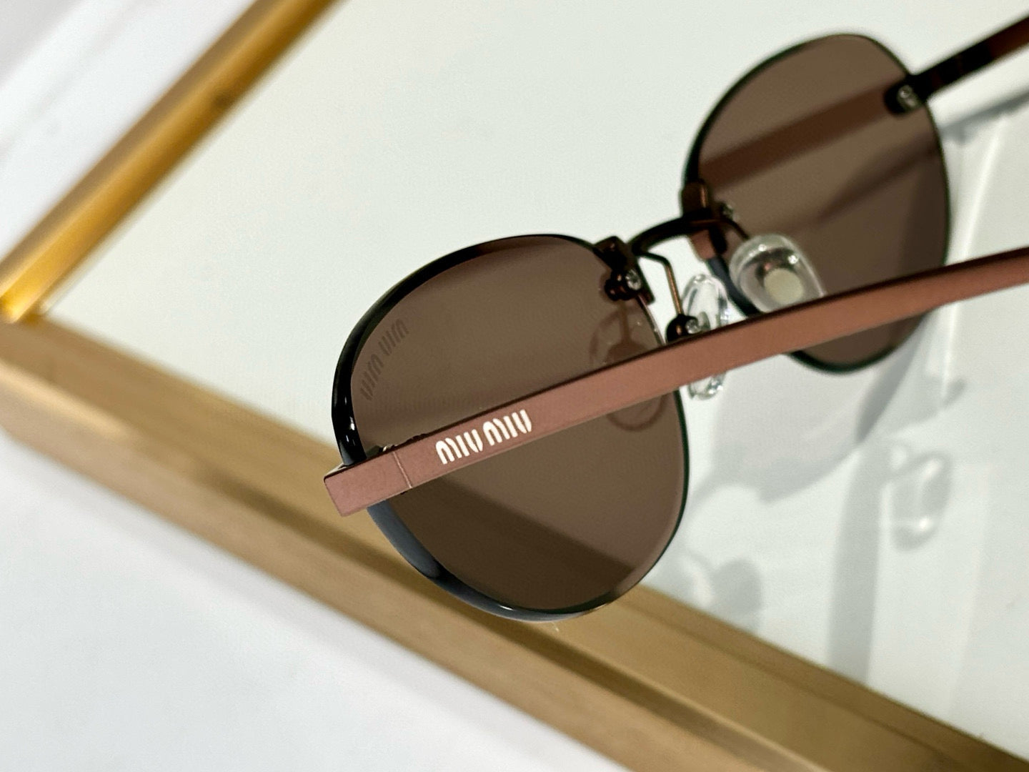 MIU M SUNGLASSES