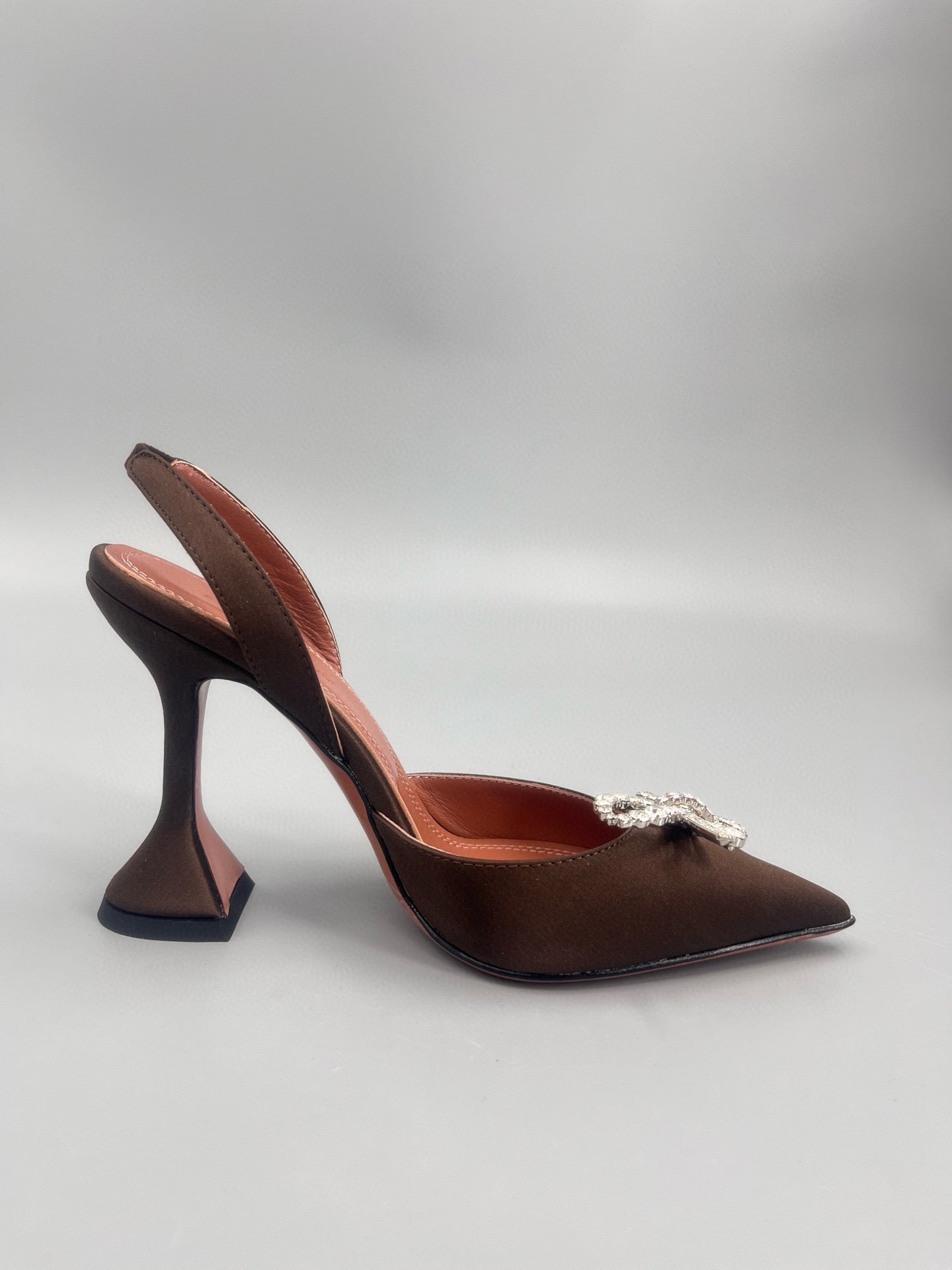 AMINA M HEELS