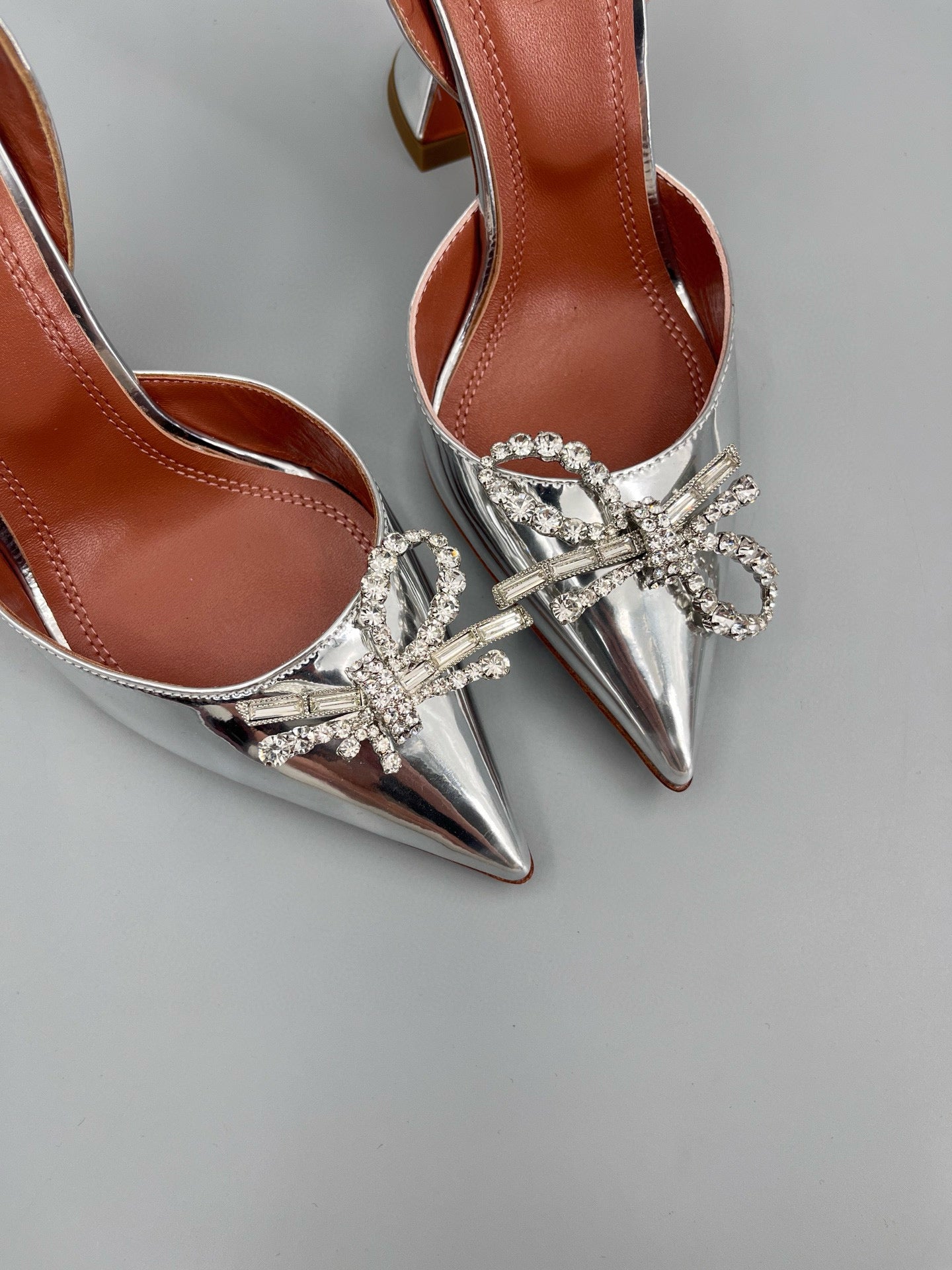 AMINA M HEELS