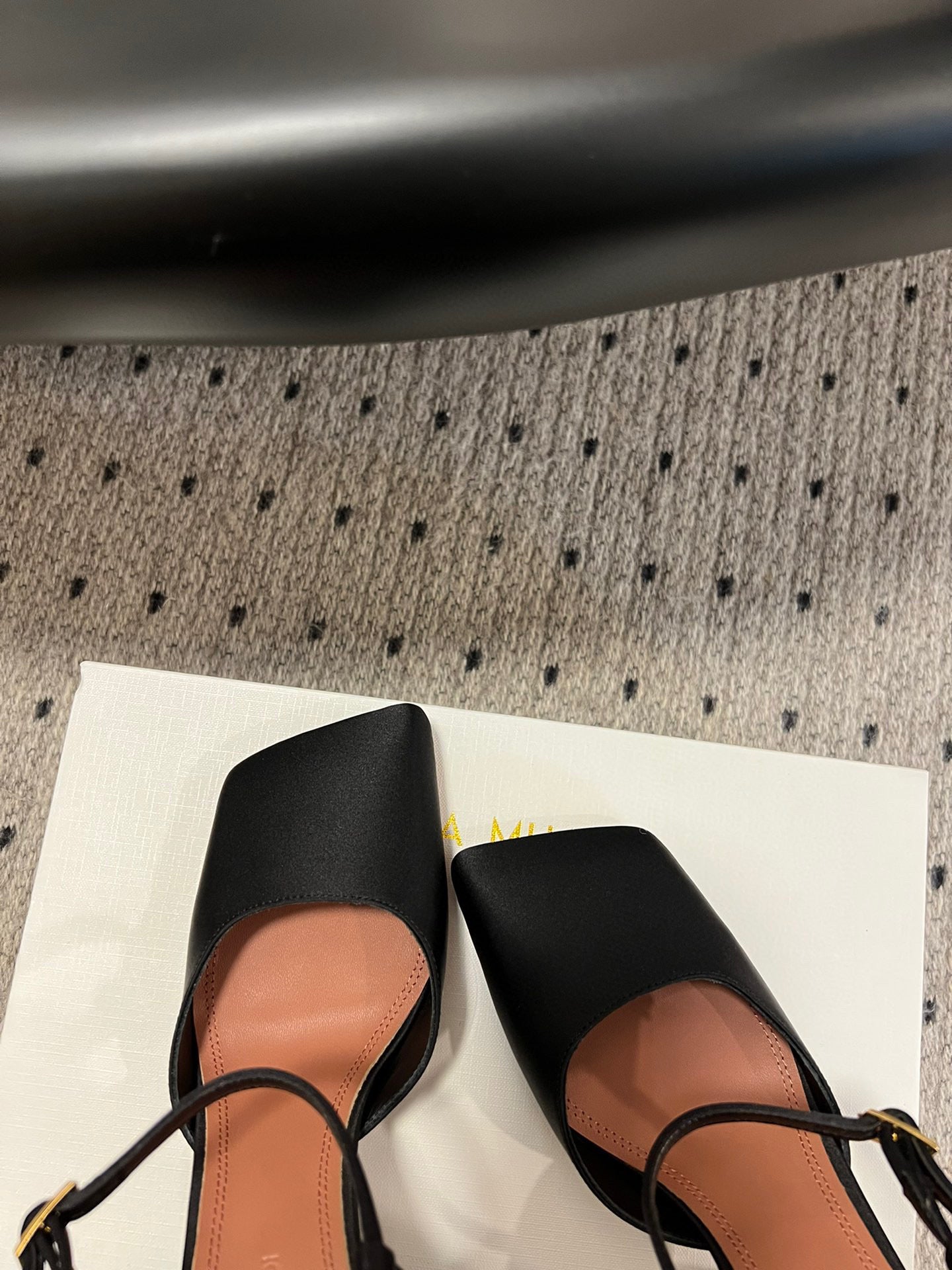 AMINA M HEELS