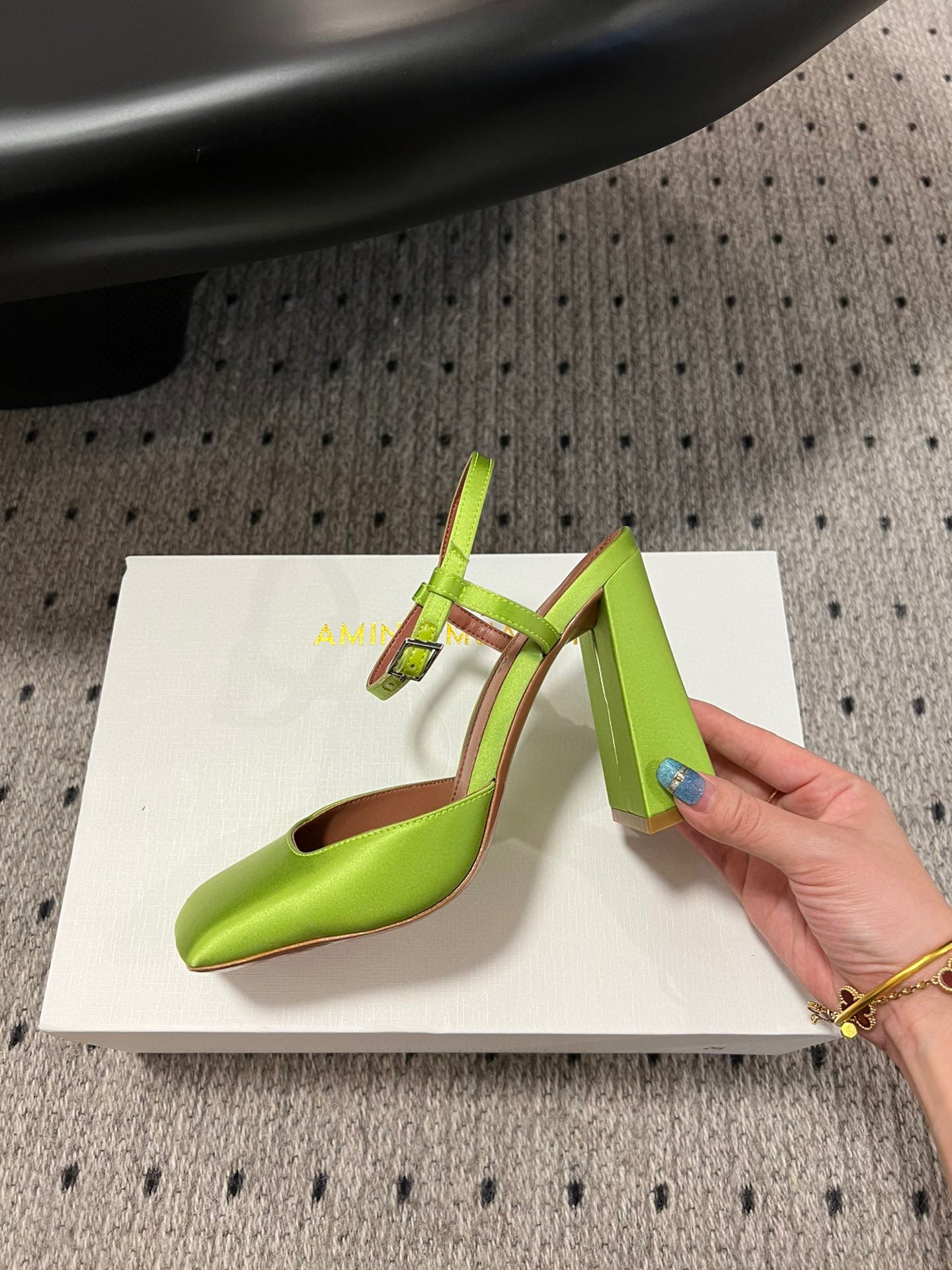 AMINA M HEELS