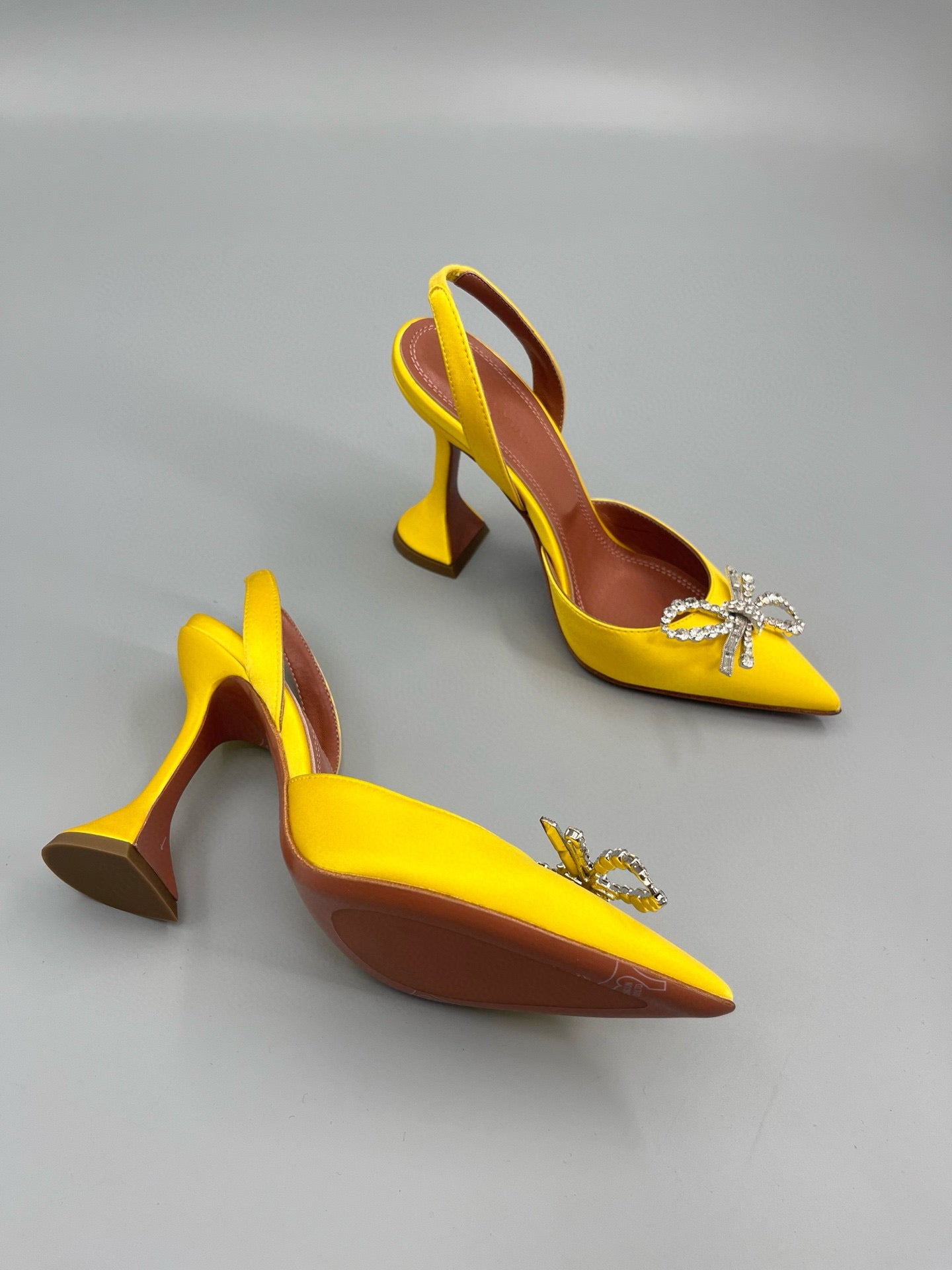 AMINA M HEELS