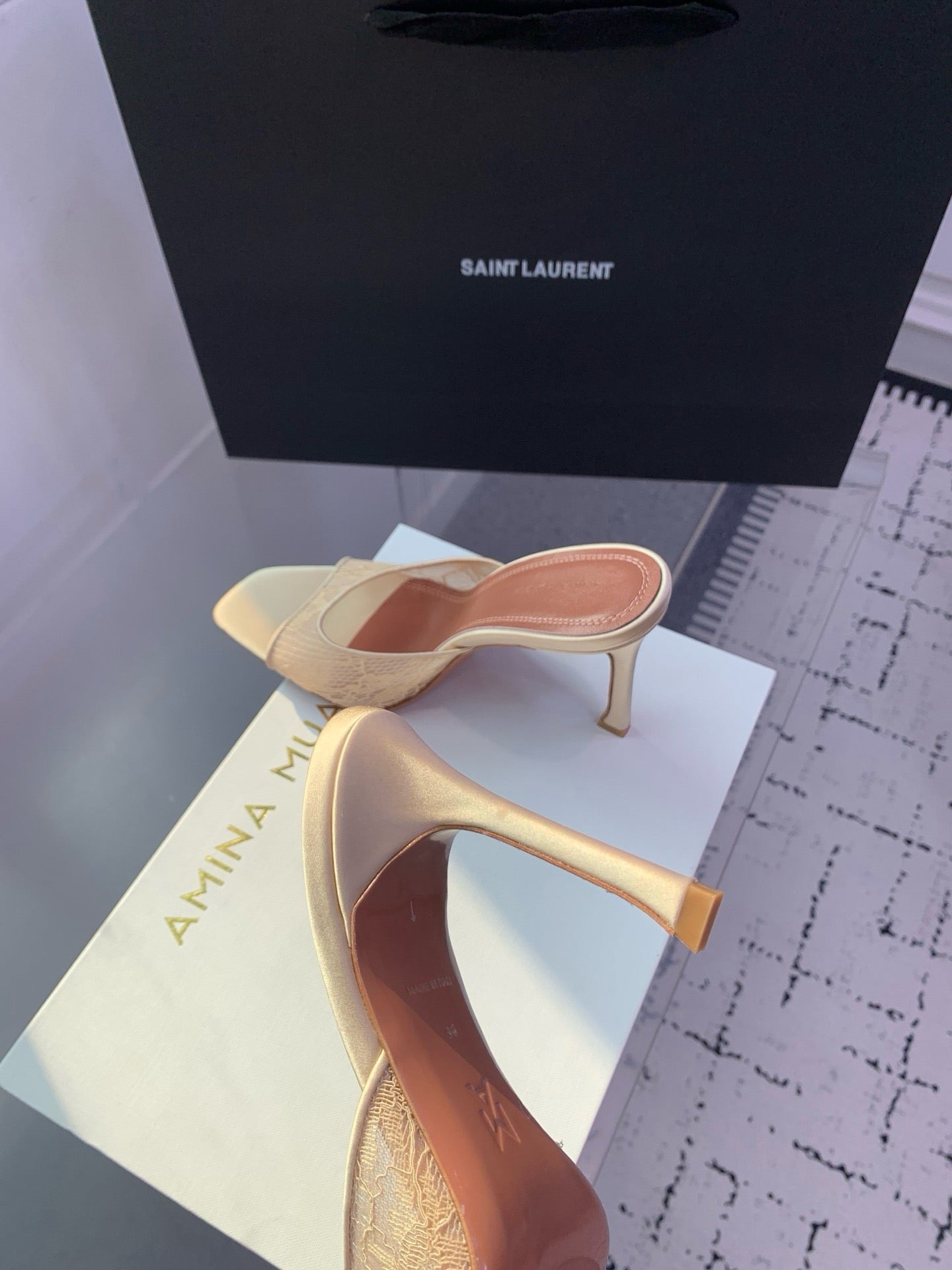 AMINA M HEELS