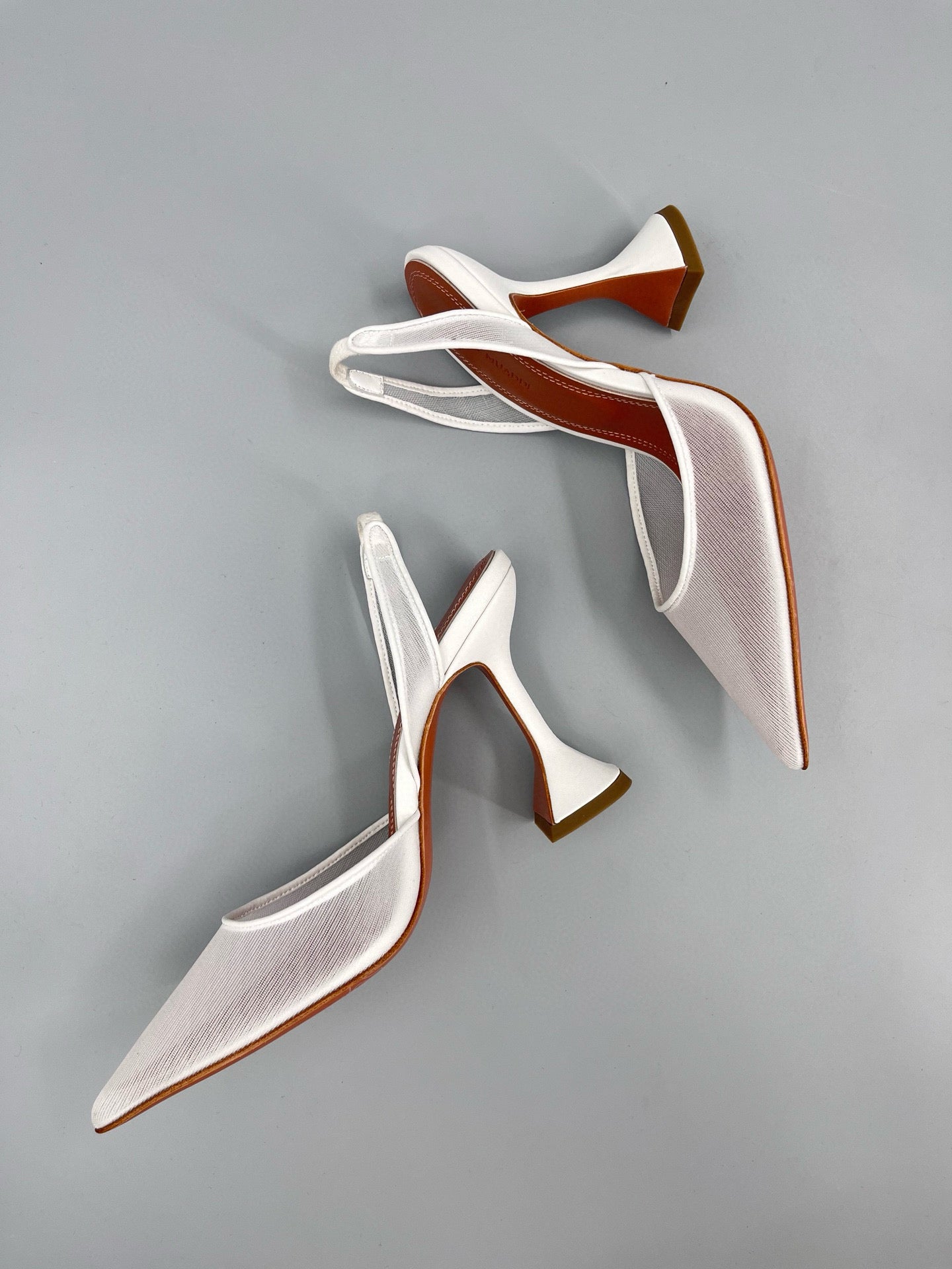 AMINA M HEELS