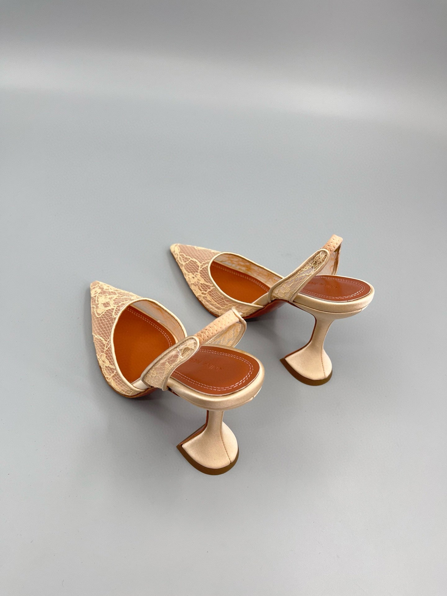 AMINA M HEELS