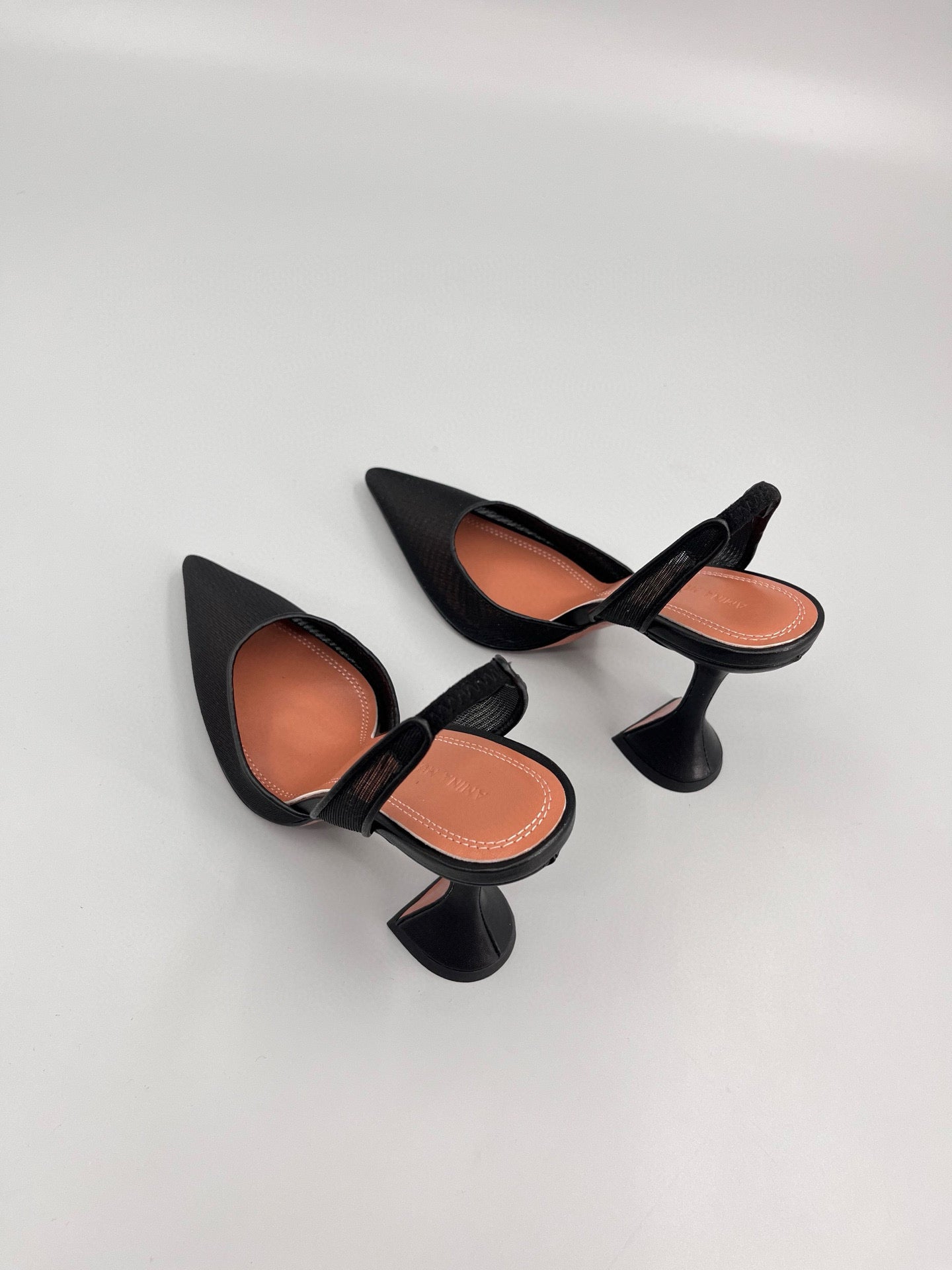 AMINA M HEELS
