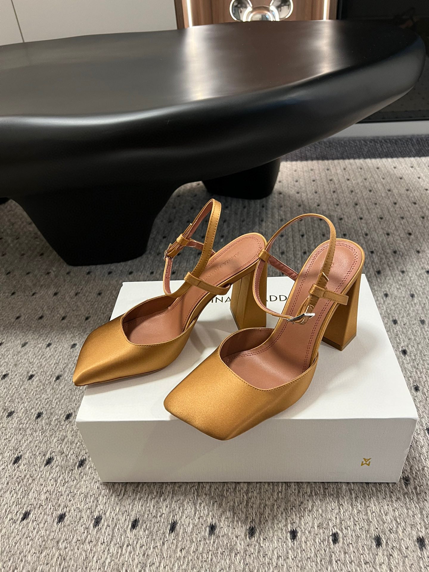 AMINA M HEELS