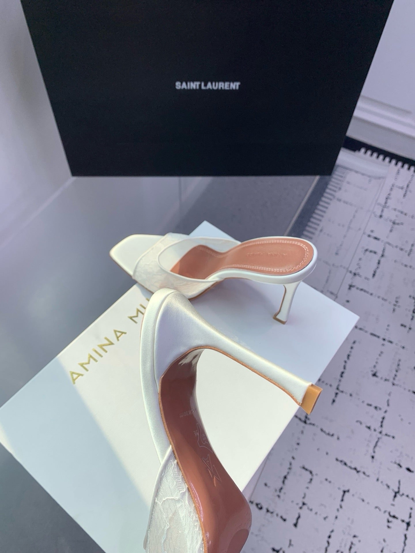 AMINA M HEELS