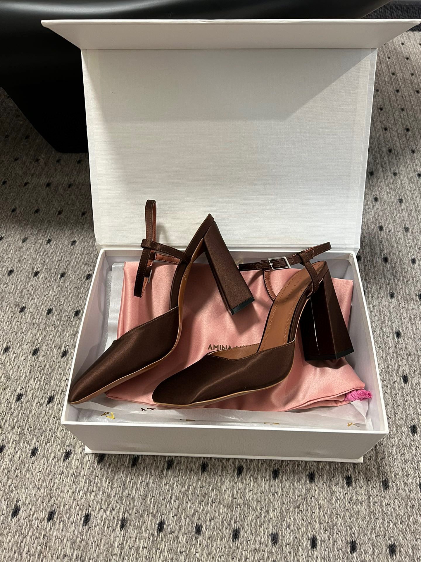 AMINA M HEELS