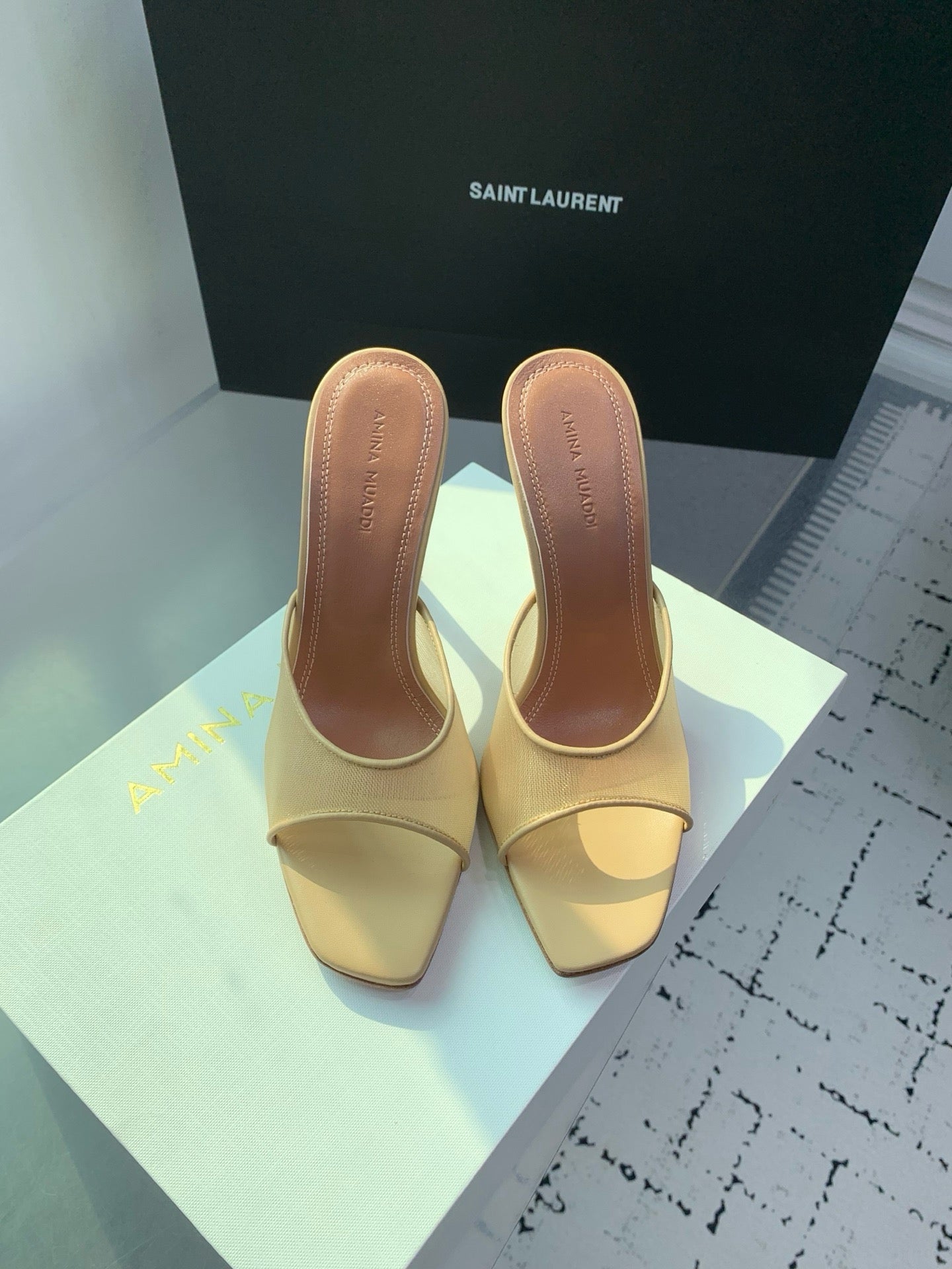 AMINA M HEELS
