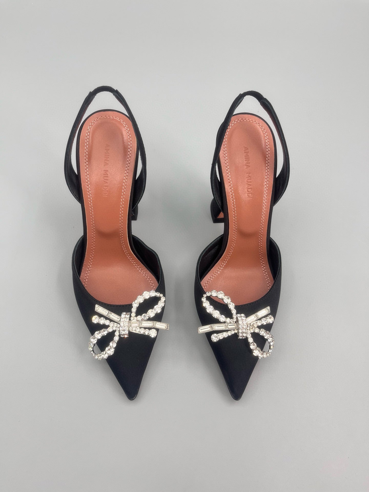 AMINA M HEELS