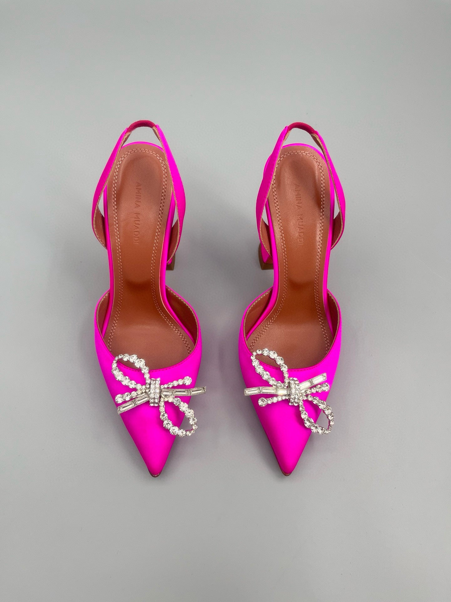 AMINA M HEELS