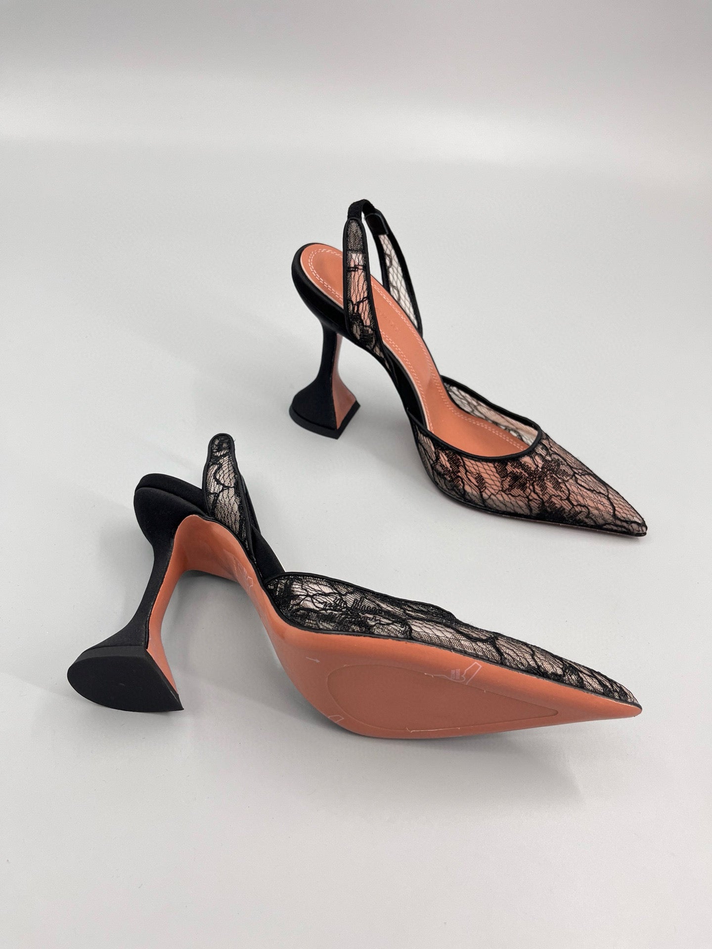 AMINA M HEELS