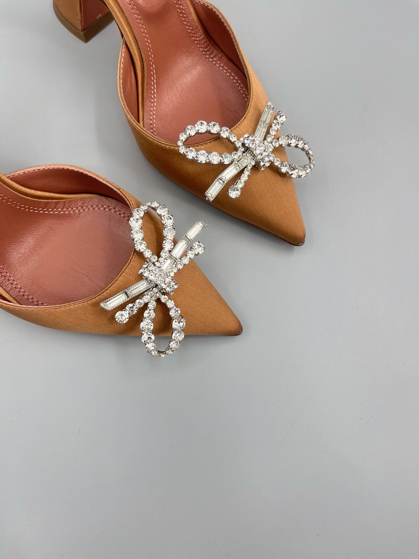 AMINA M HEELS