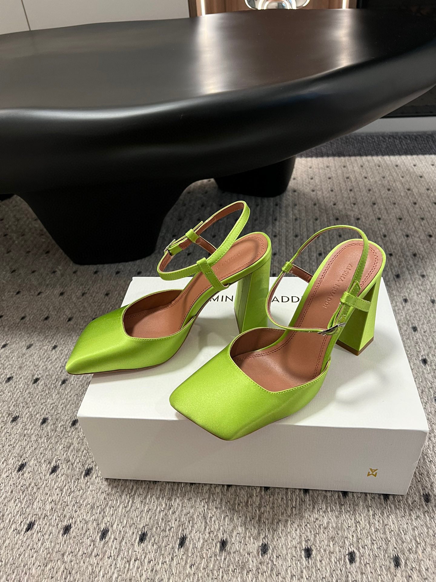 AMINA M HEELS