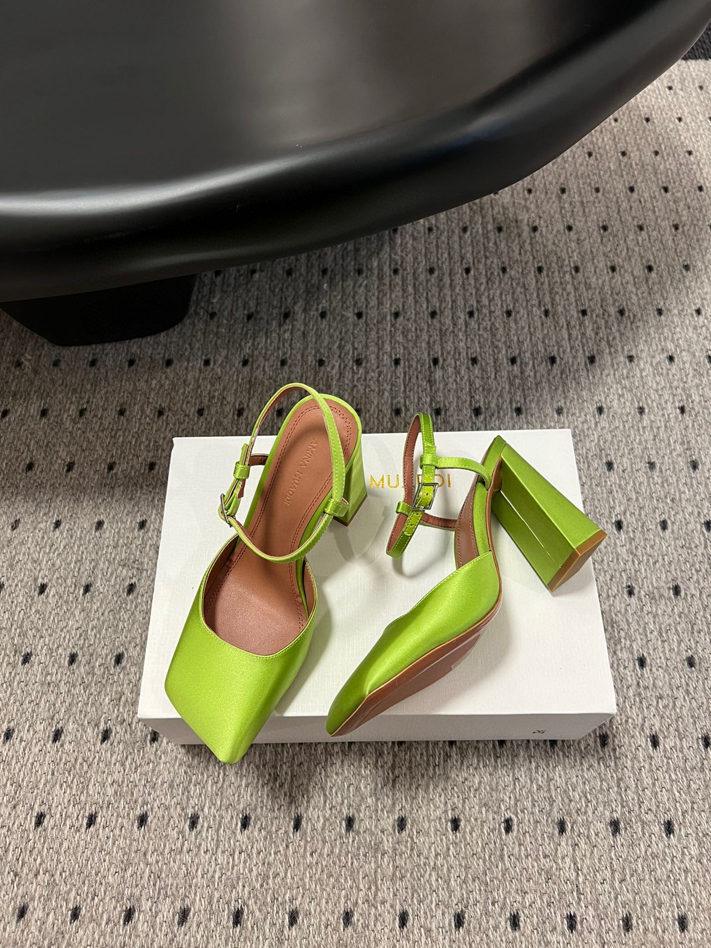 AMINA M HEELS