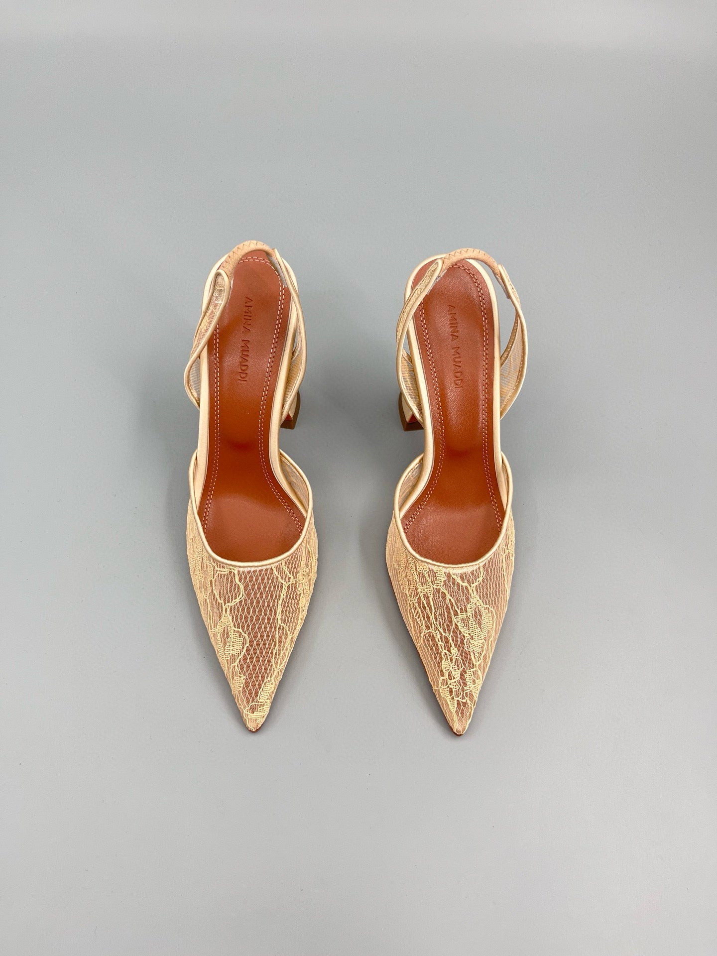 AMINA M HEELS
