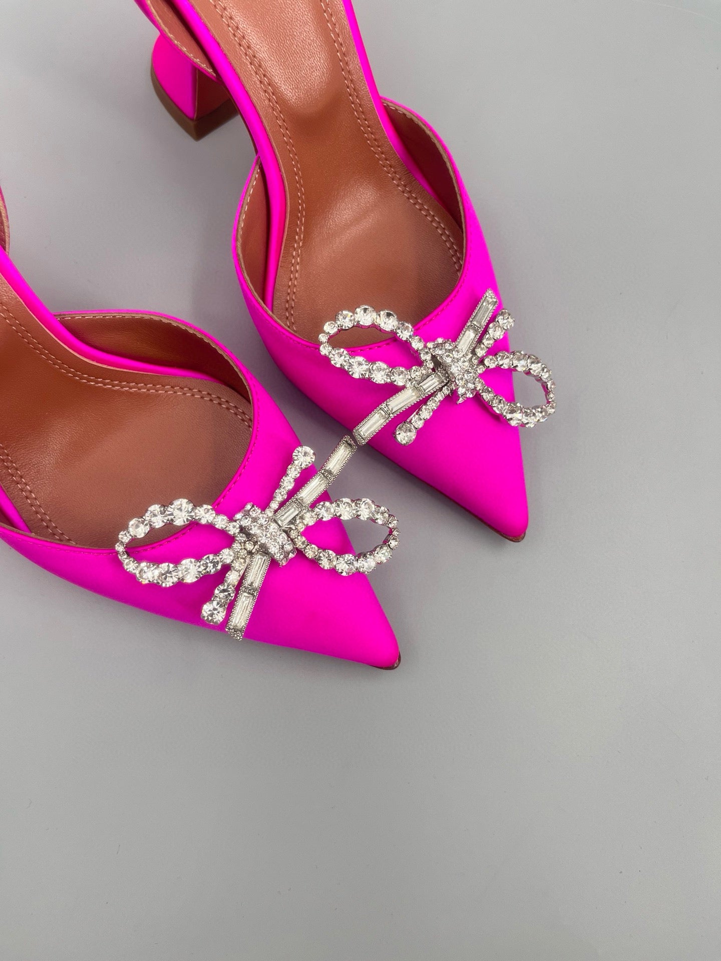 AMINA M HEELS