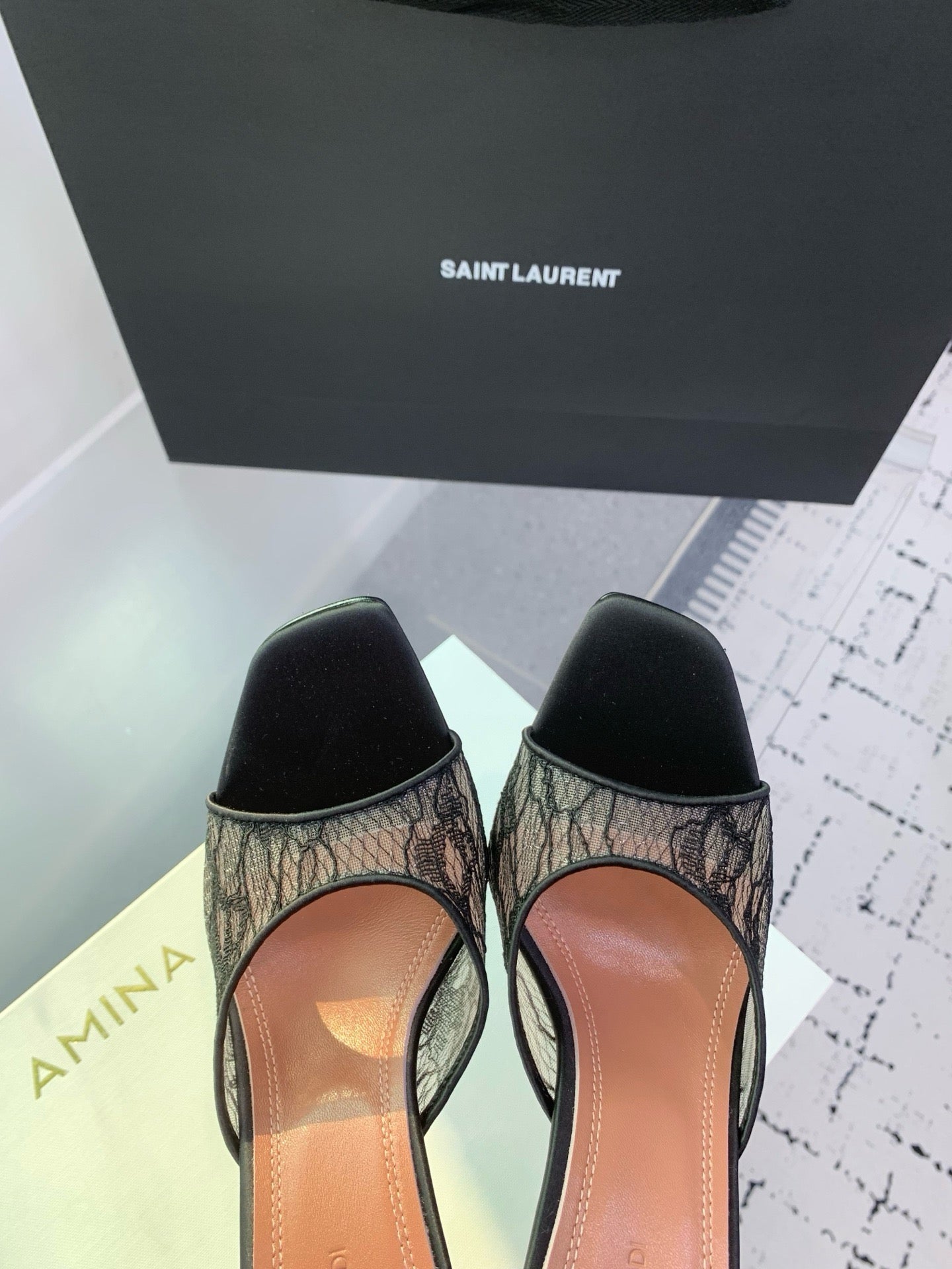 AMINA M HEELS