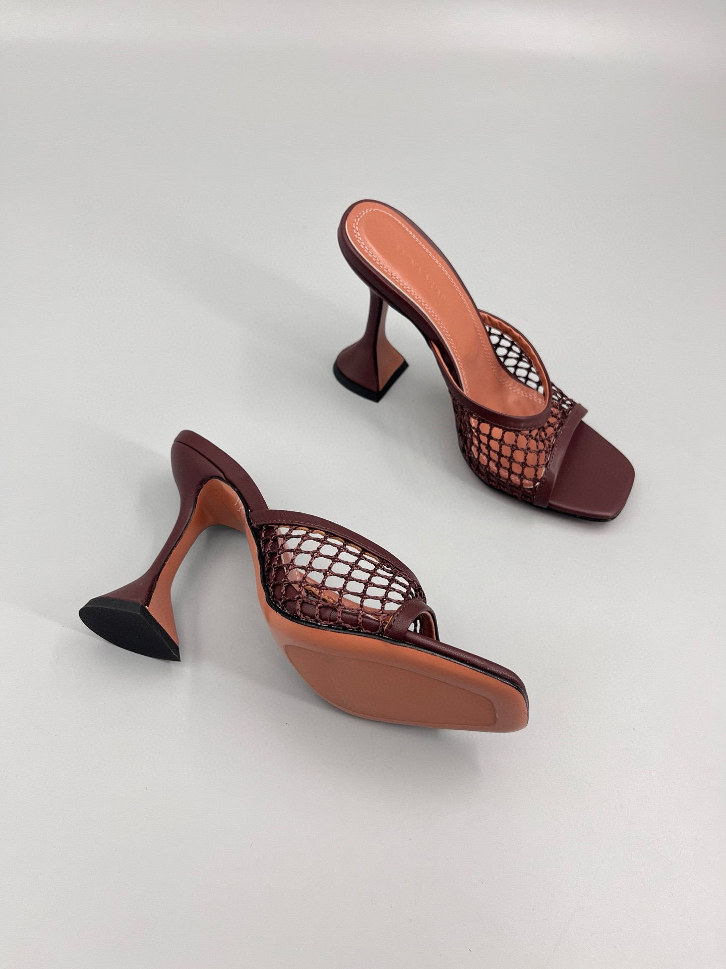 AMINA M HEELS